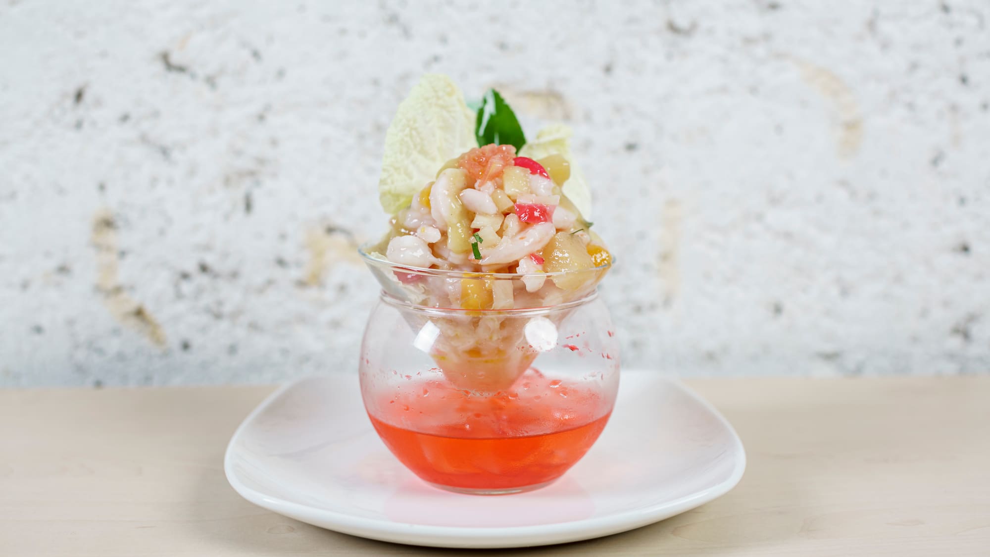 a glass bowl with food in it