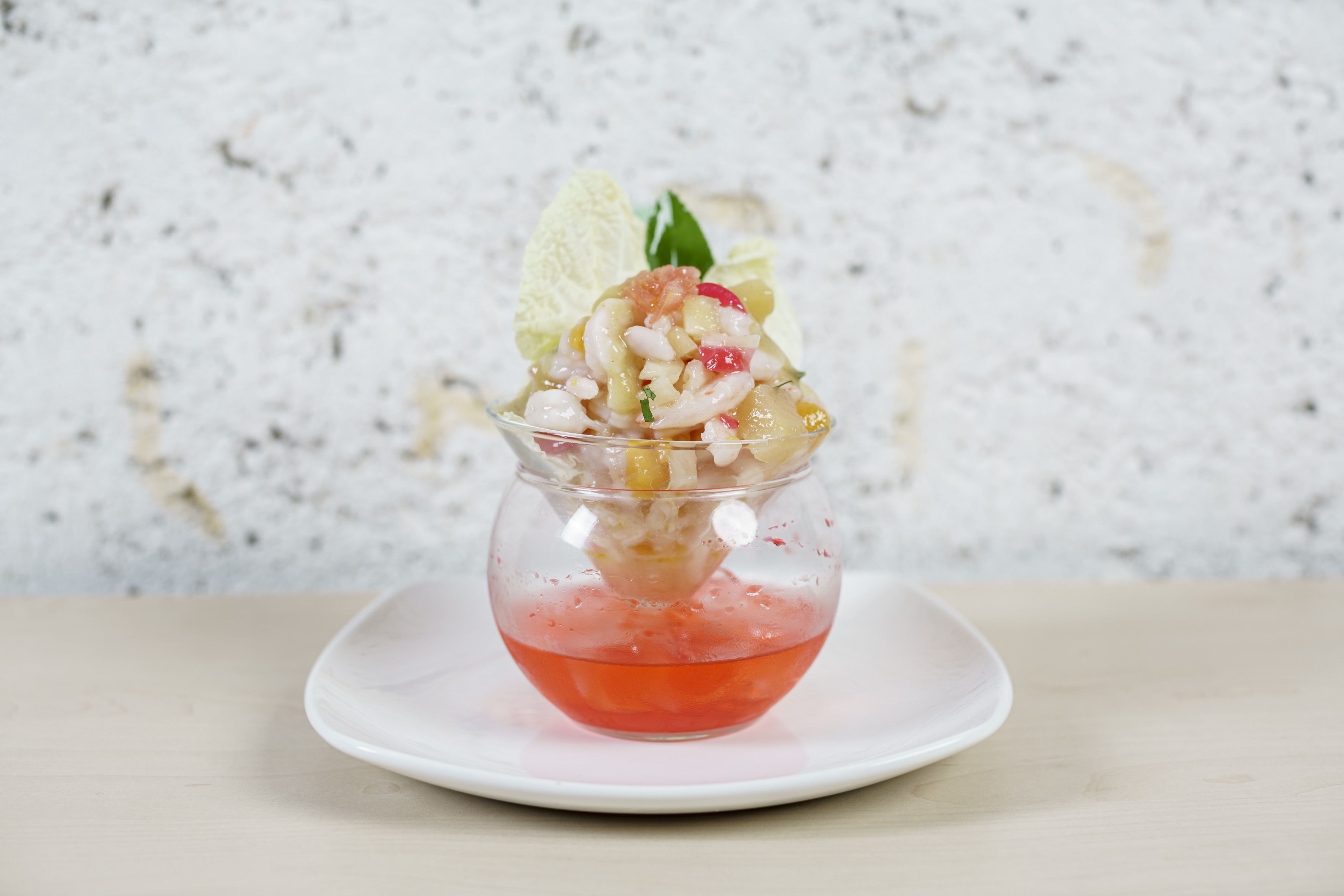 a glass bowl with food in it