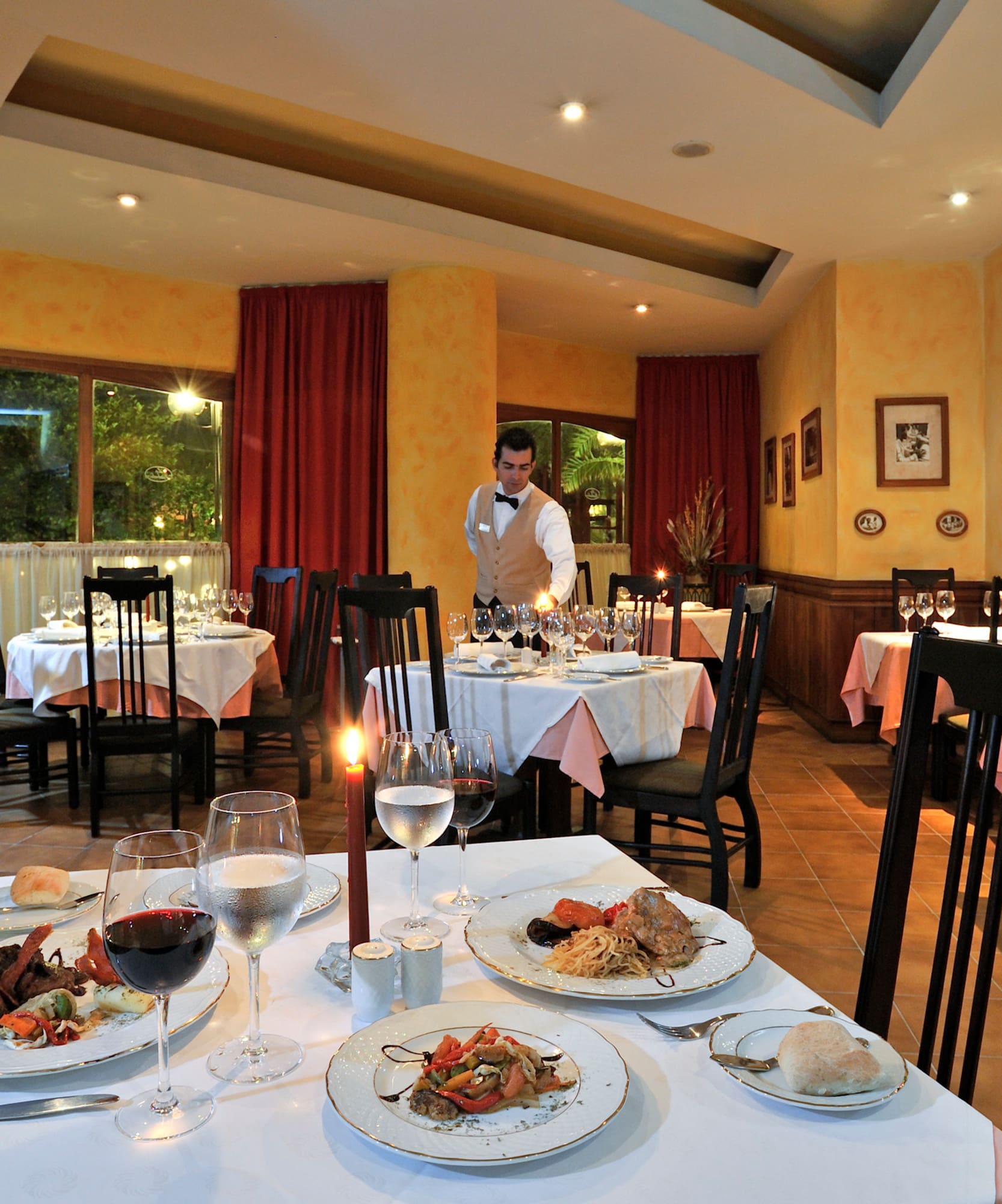a restaurant with tables and chairs