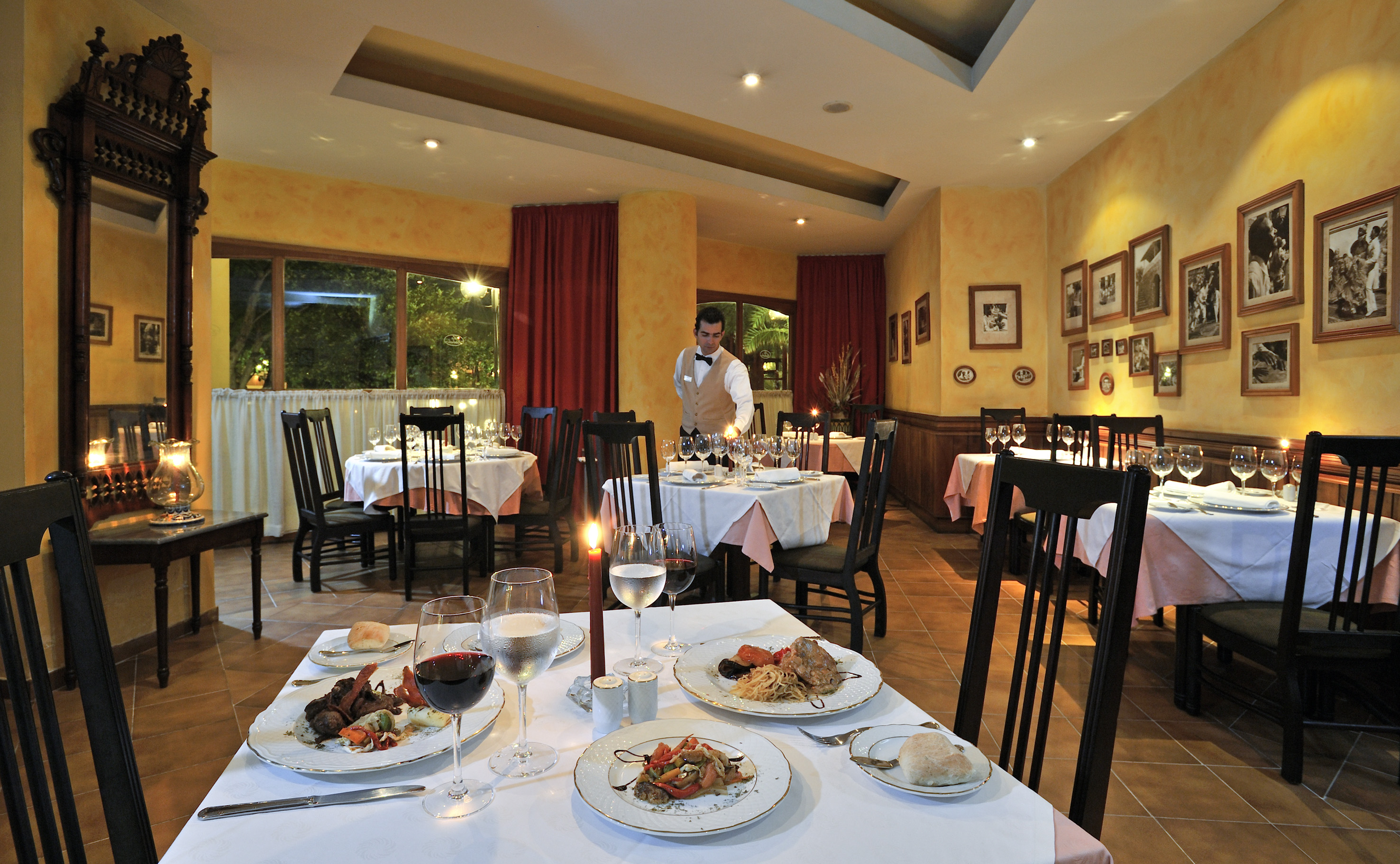 a restaurant with tables and chairs