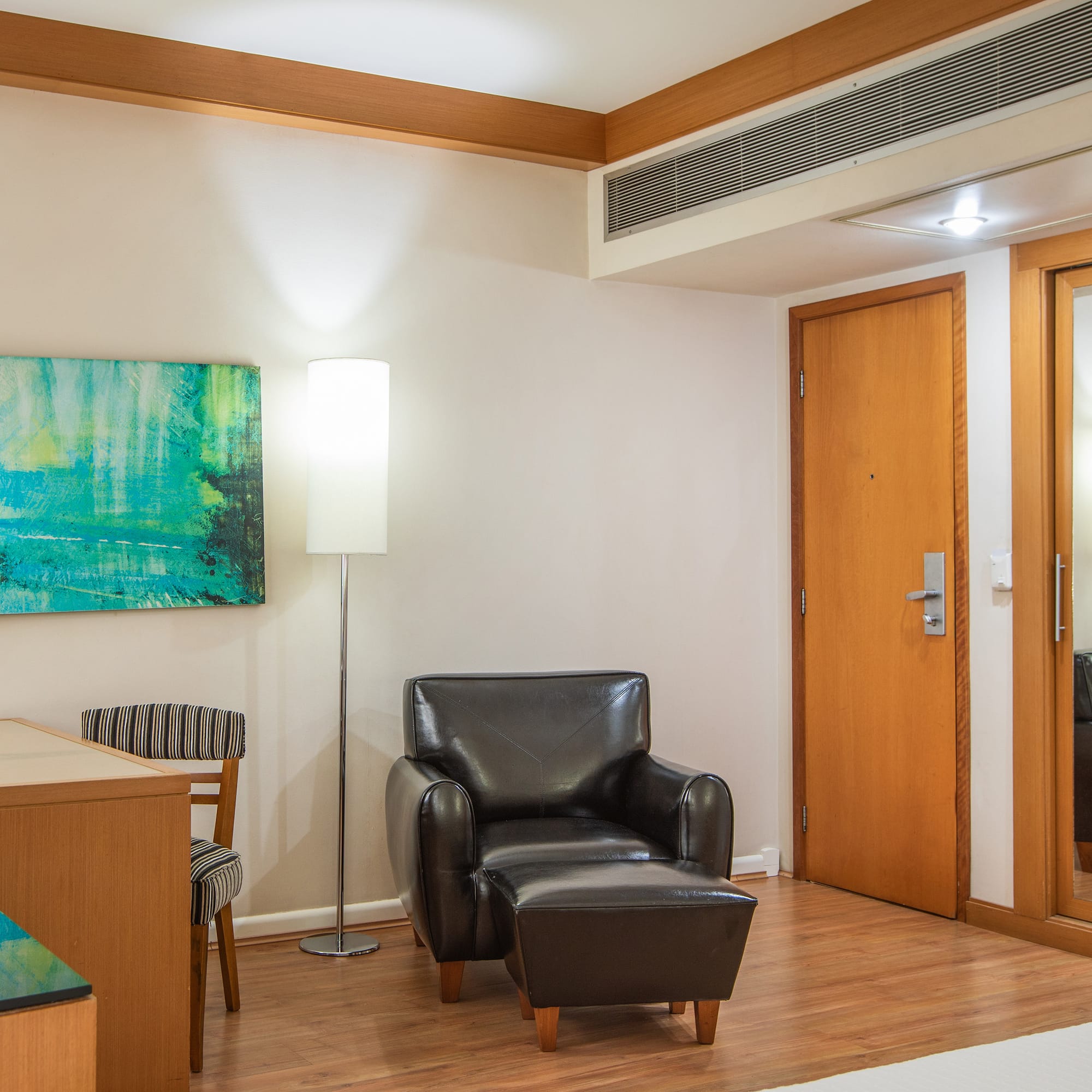 a room with a chair and a table