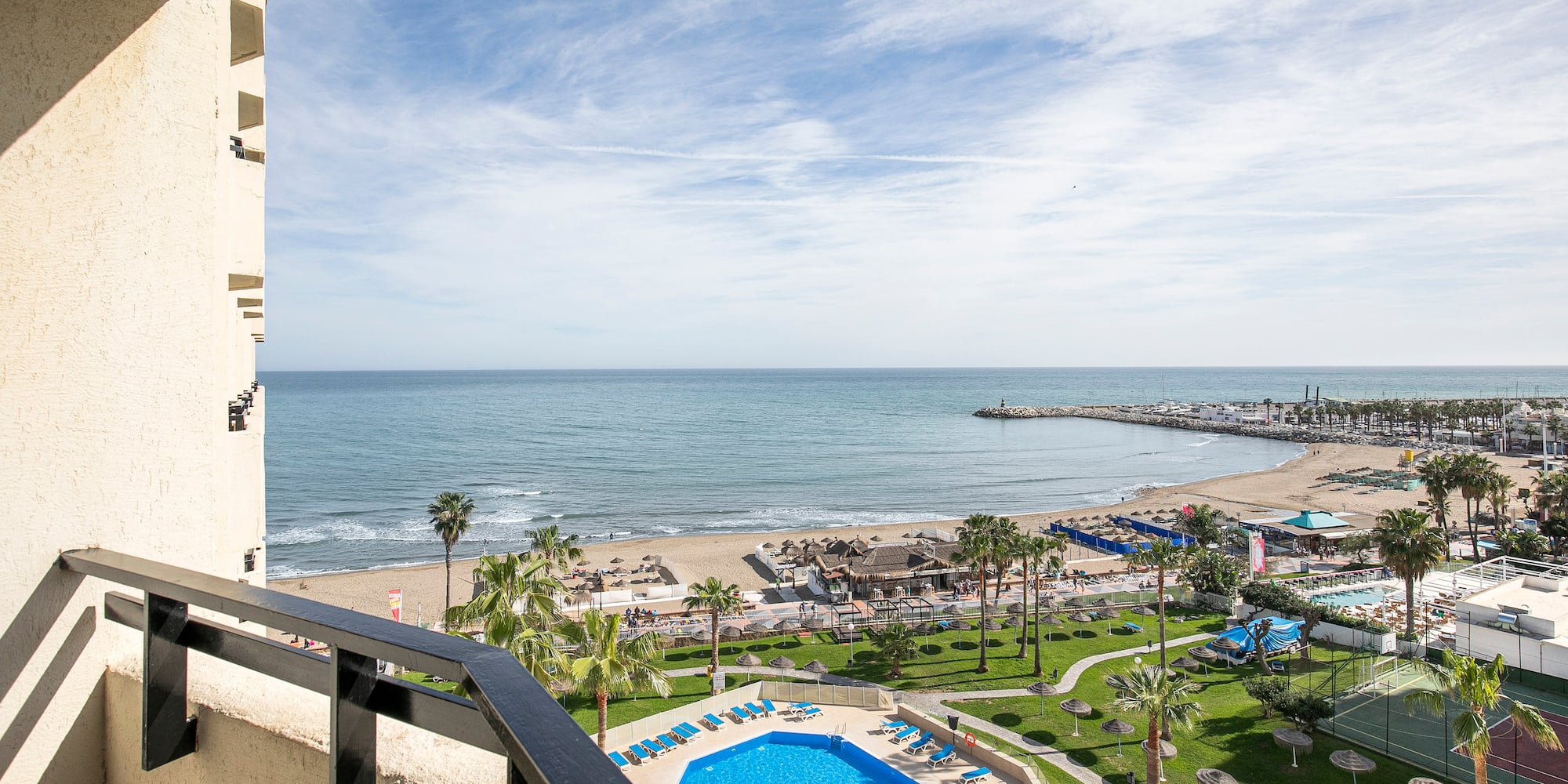 a view of a beach from a balcony