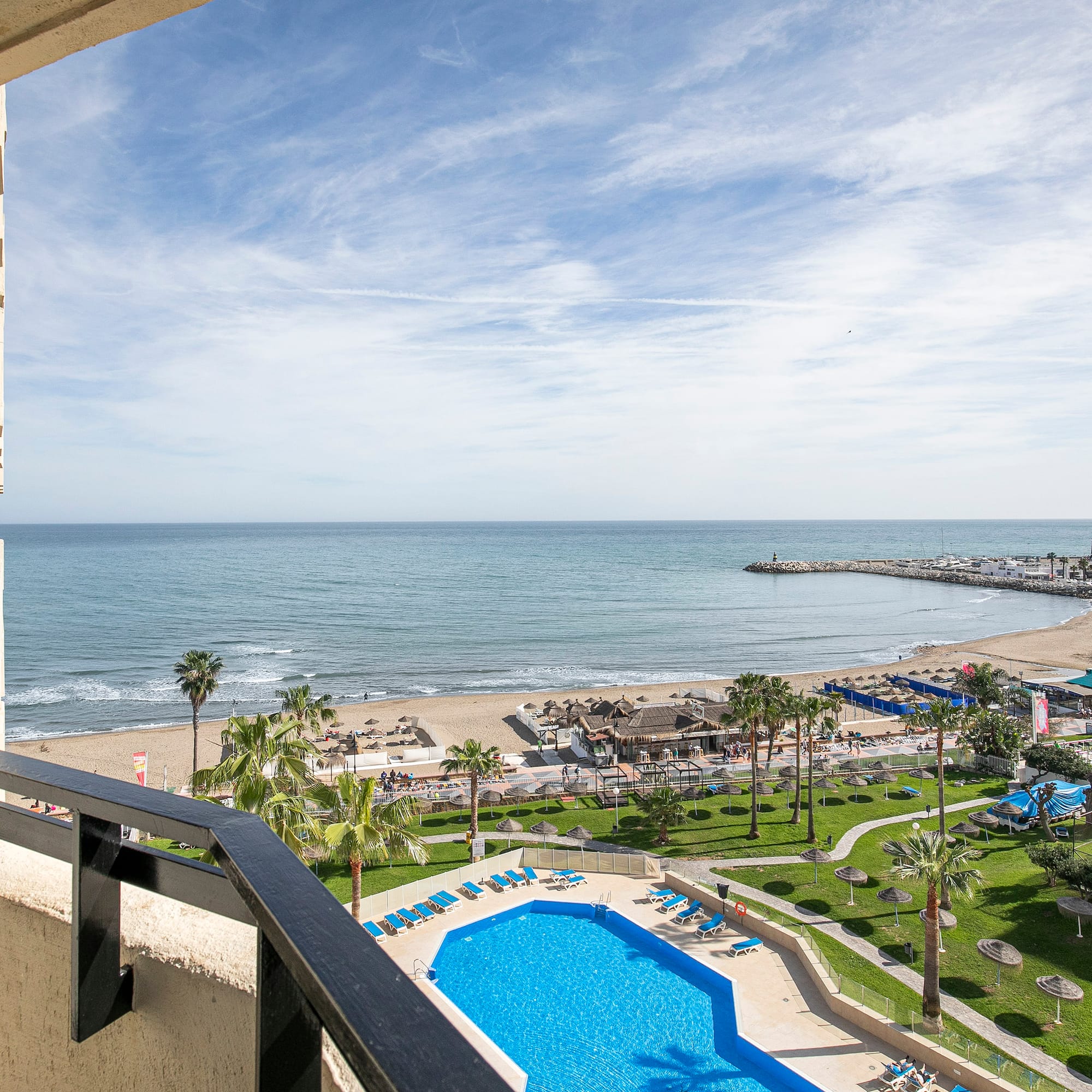a view of a beach from a balcony