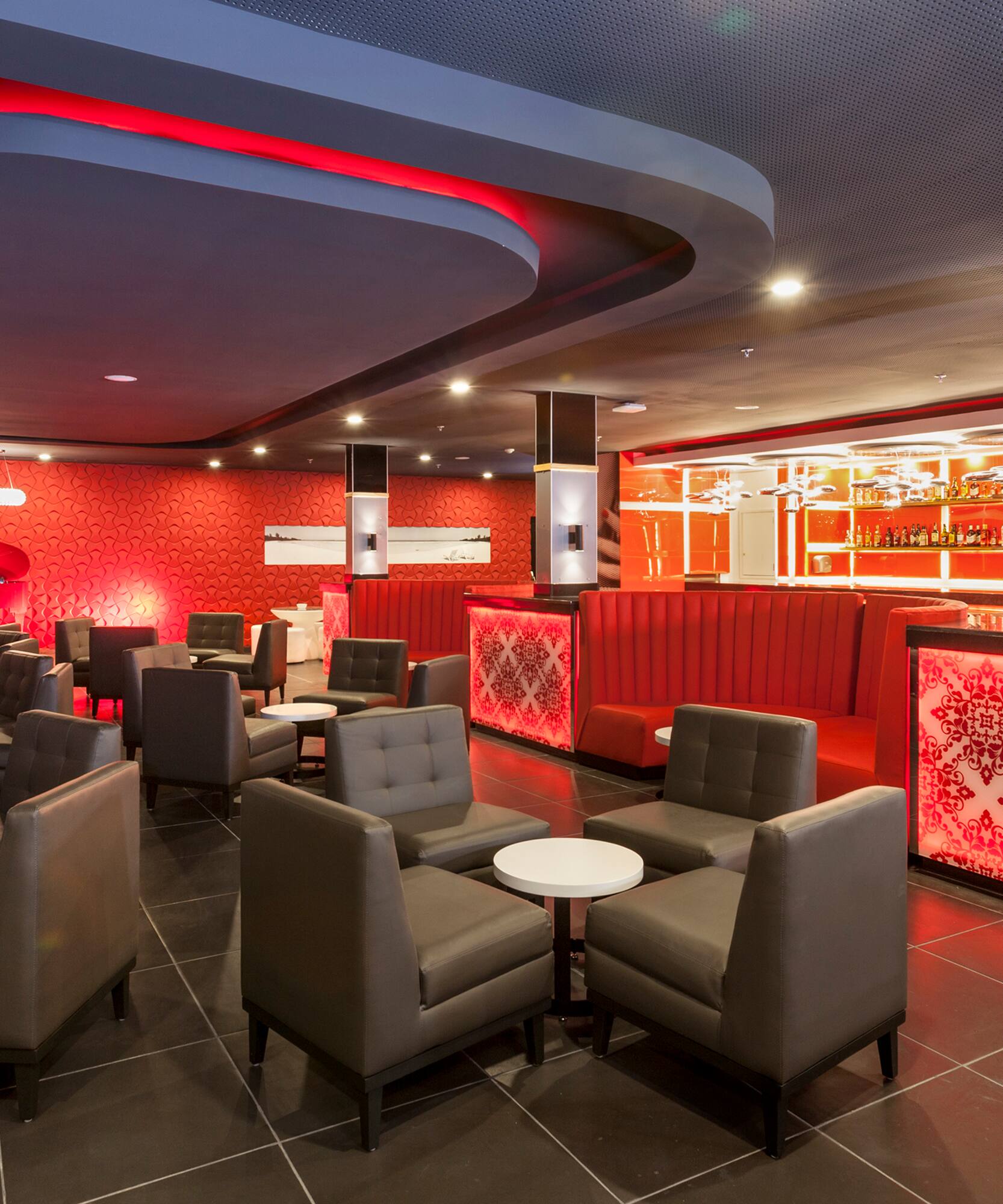 a room with chairs and tables