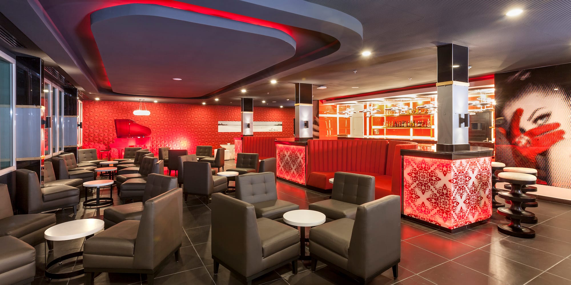 a room with chairs and tables