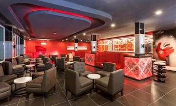 a room with chairs and tables