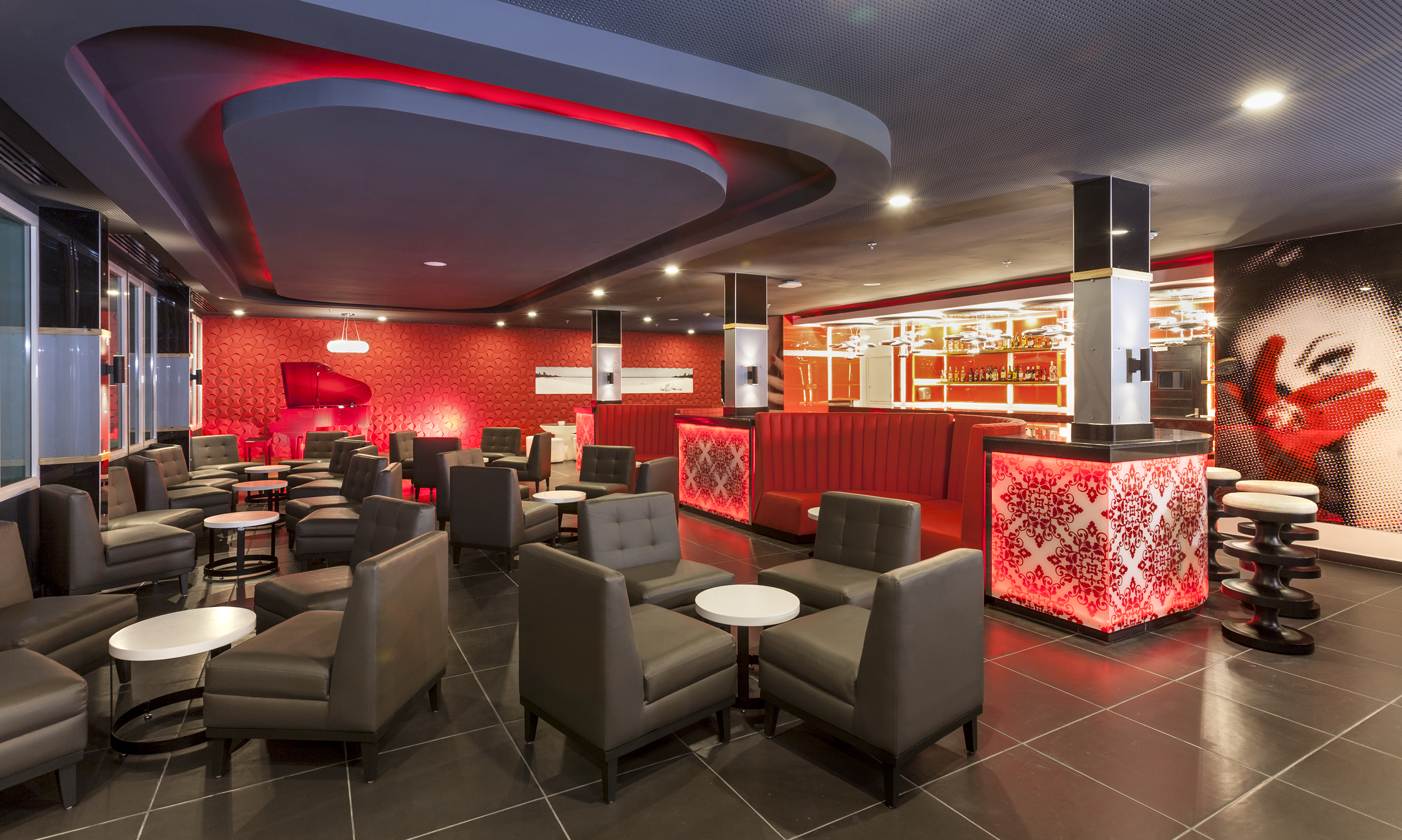 a room with chairs and tables