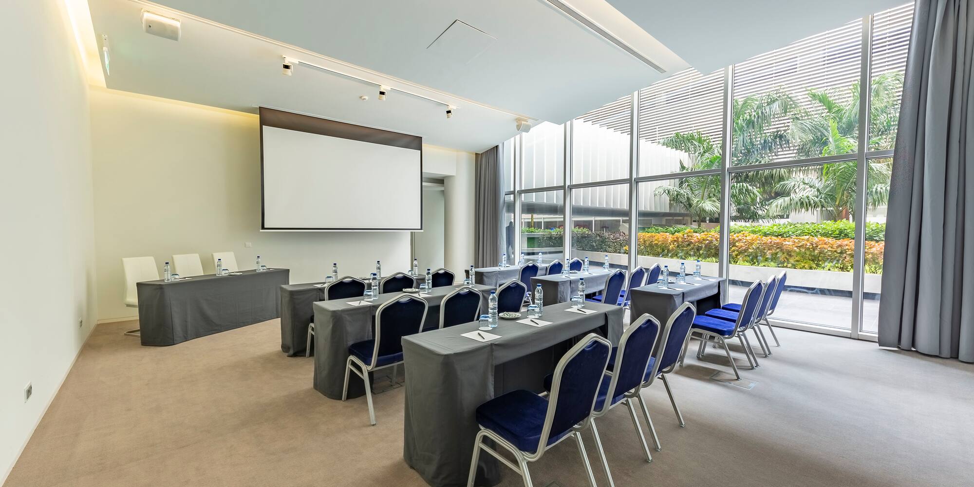 a room with tables and chairs