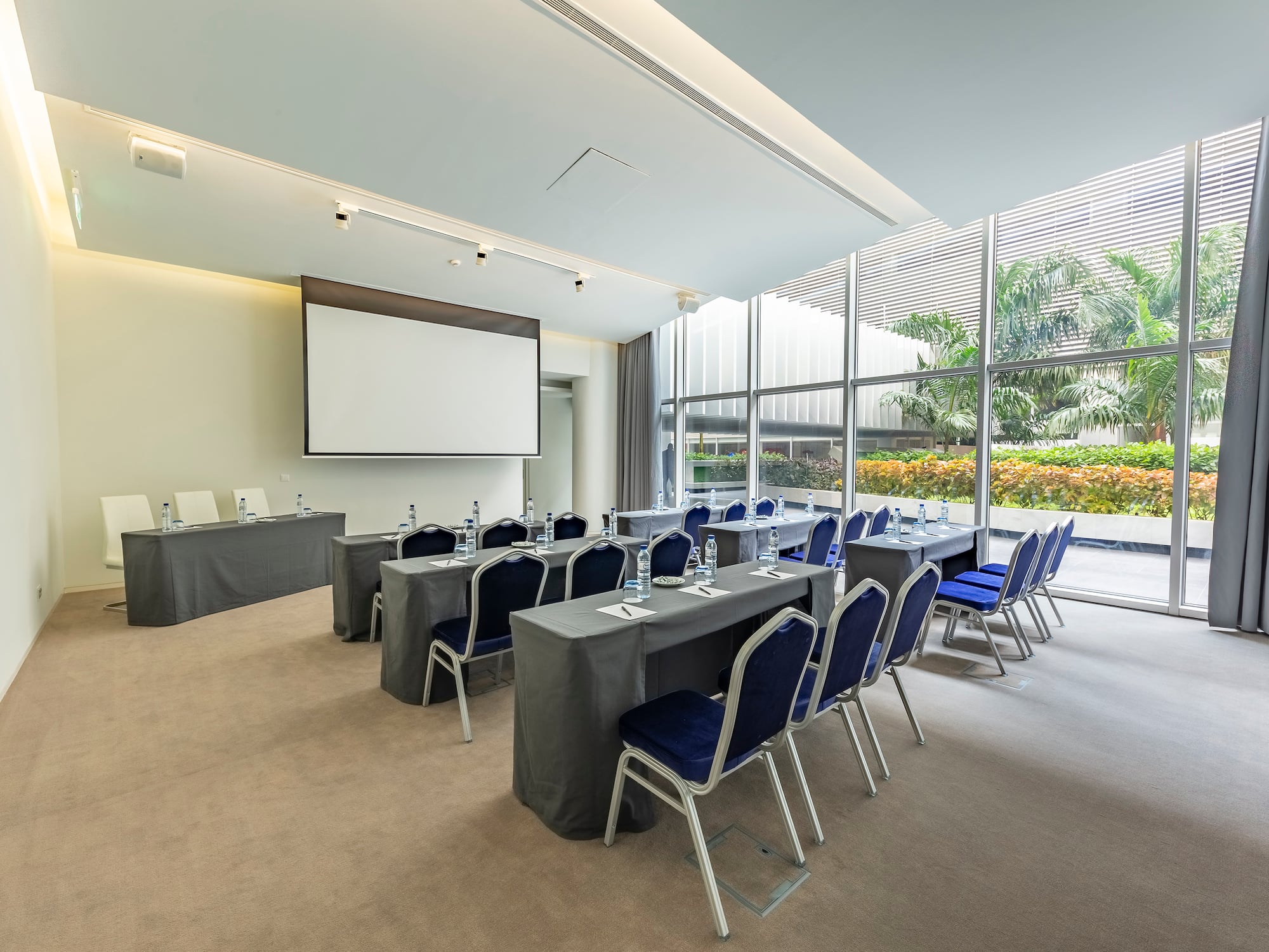 a room with tables and chairs