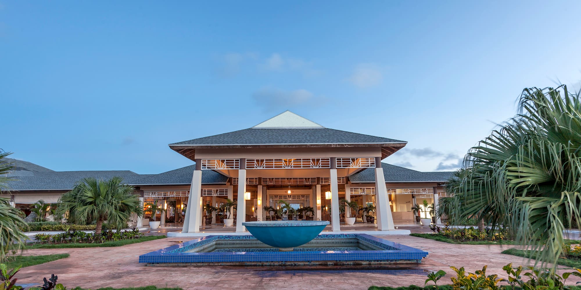 a building with a fountain in front of it