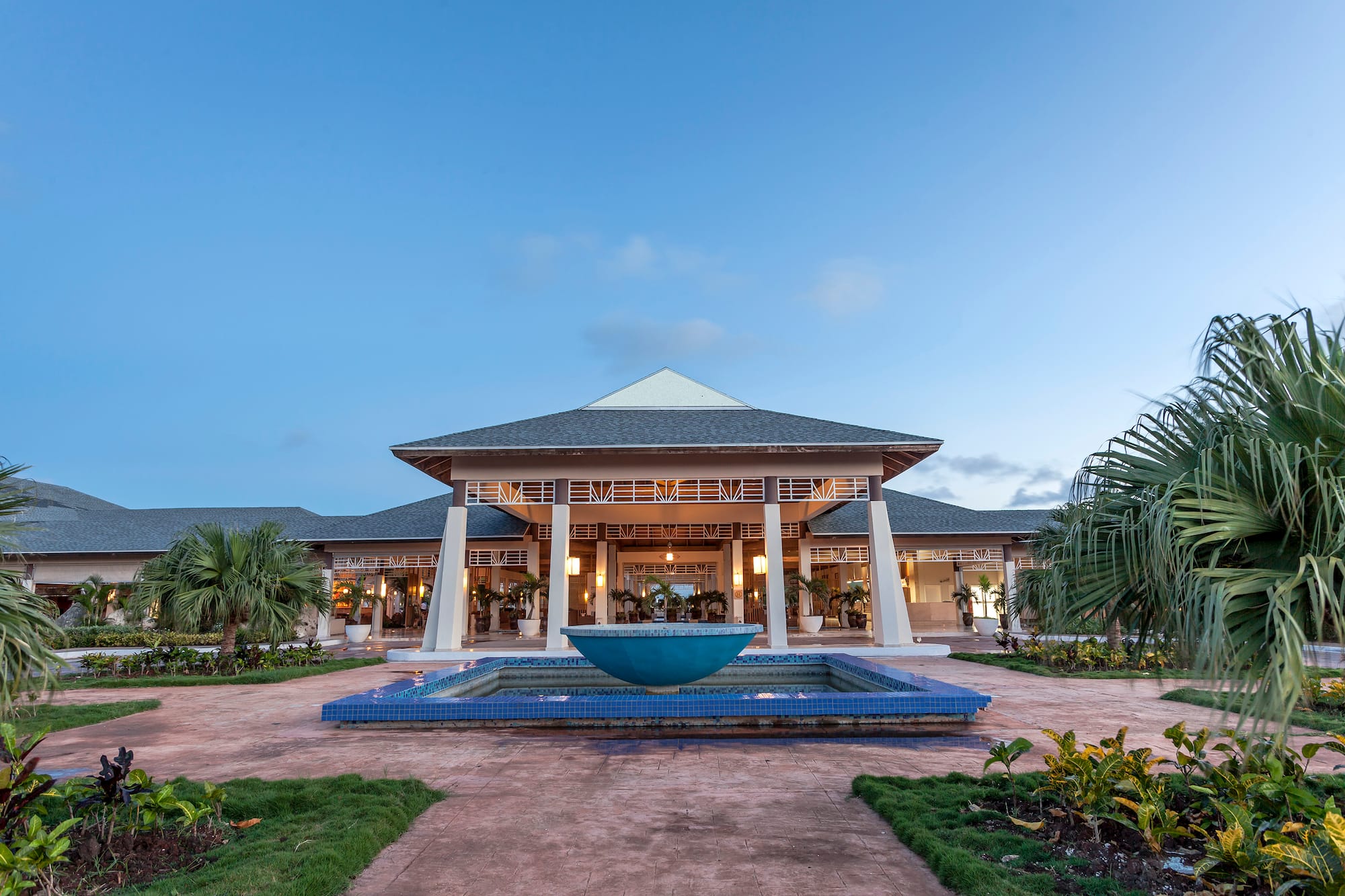 a building with a fountain in front of it