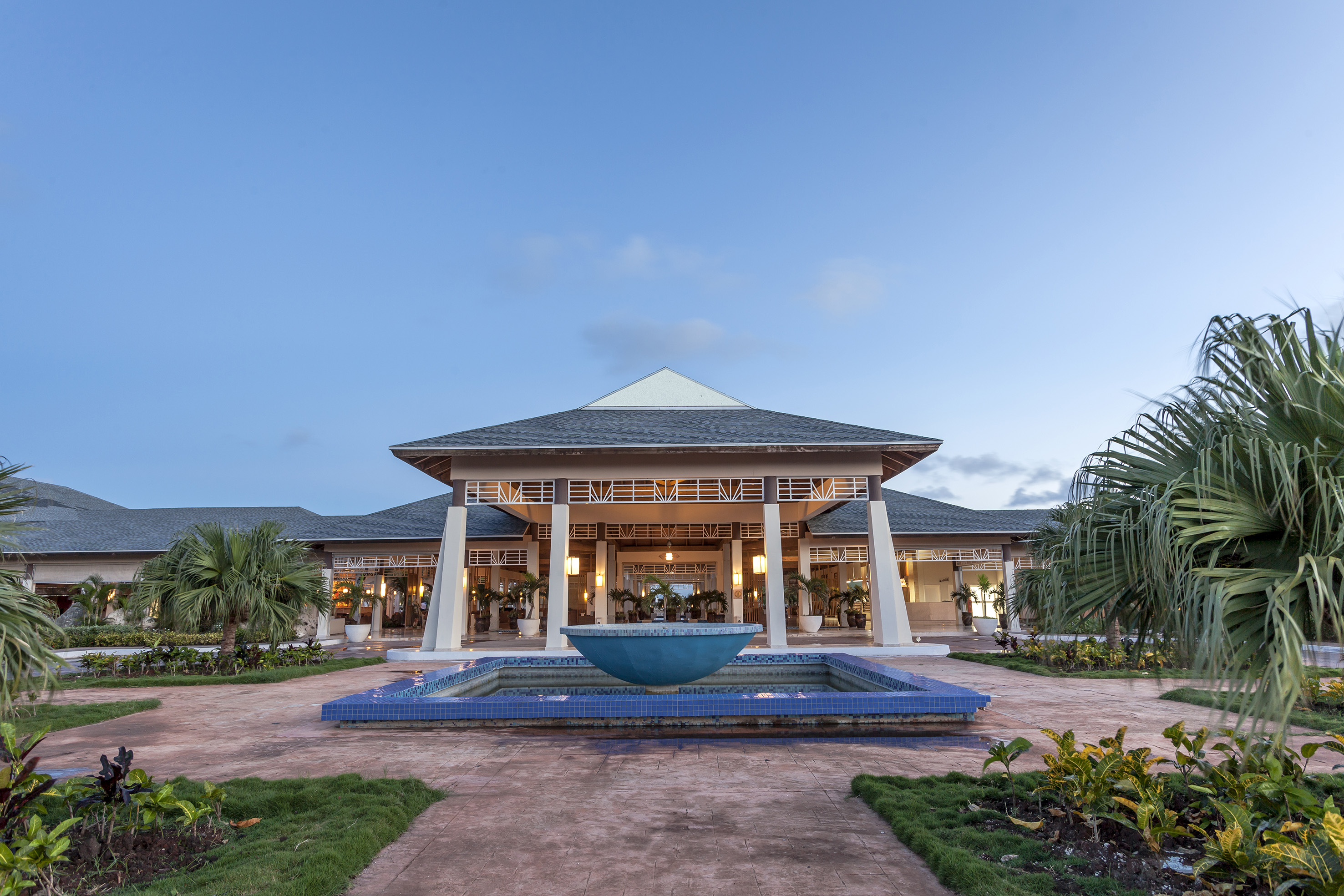 a building with a fountain in front of it