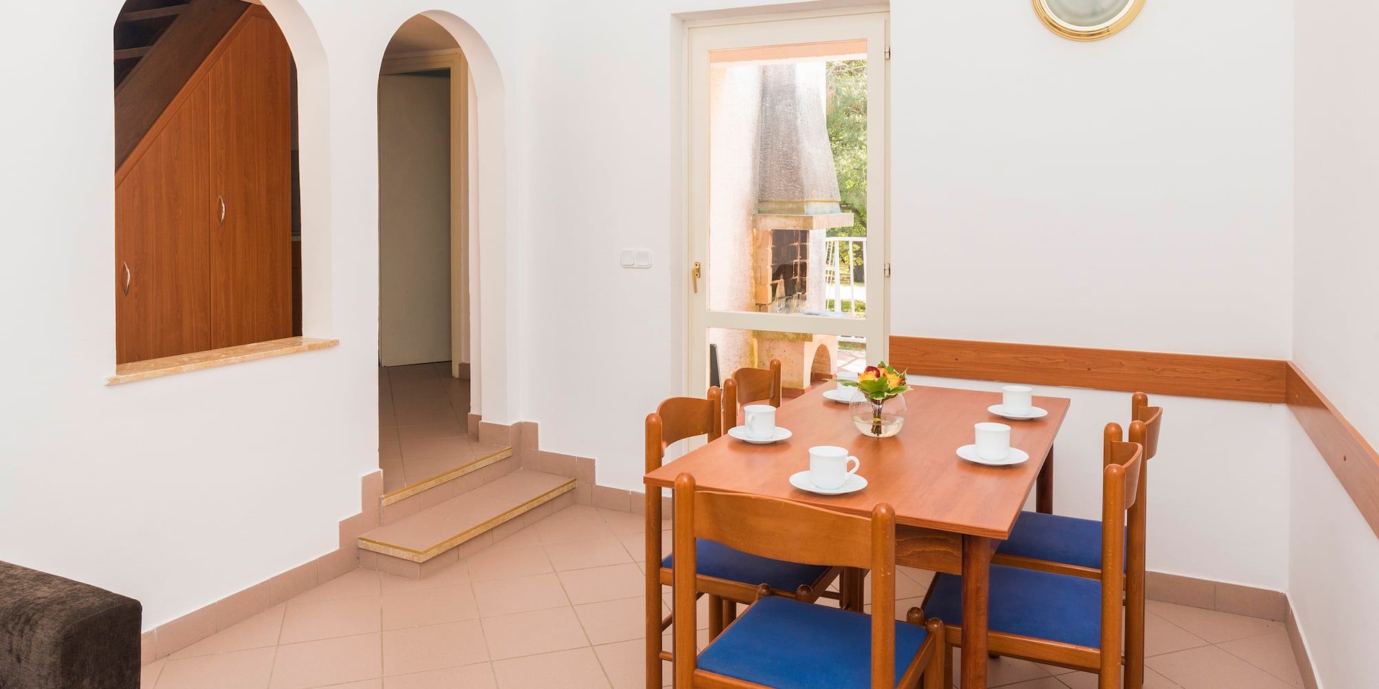 a table and chairs in a room