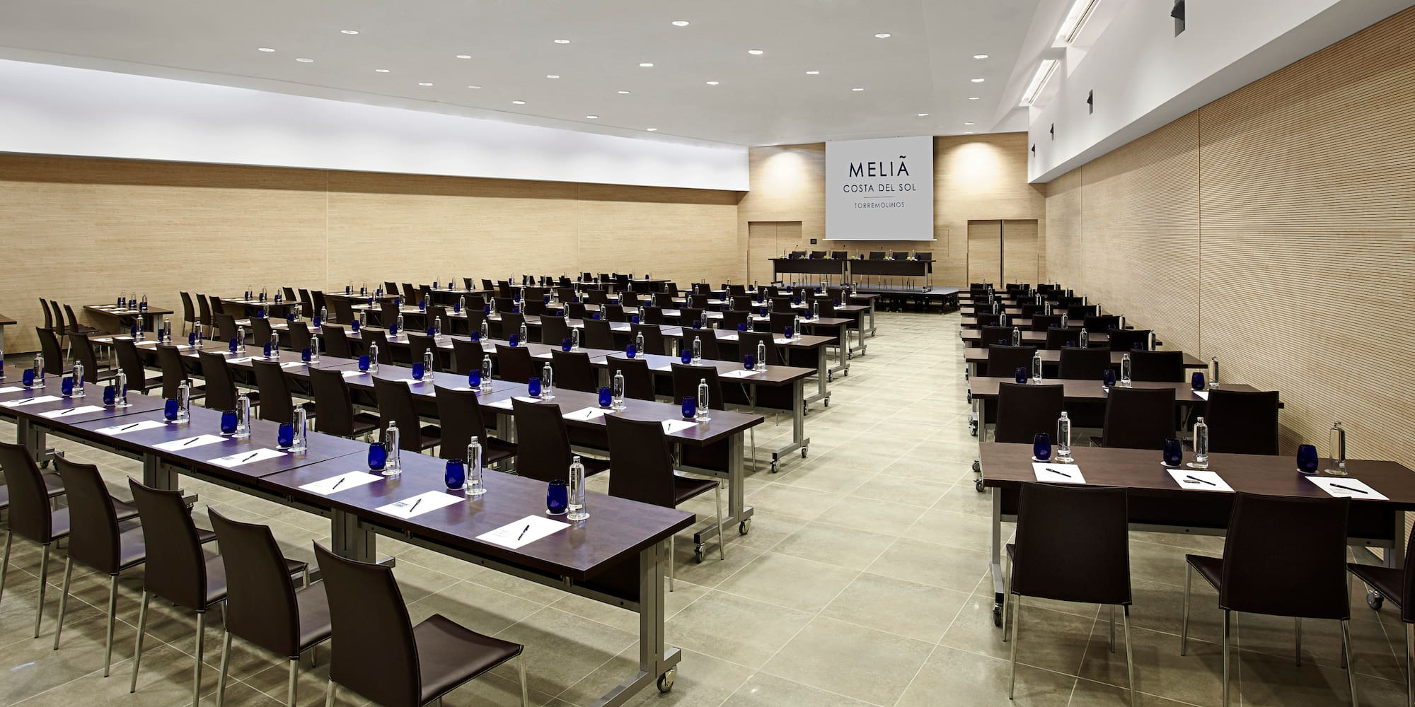 a room with tables and chairs