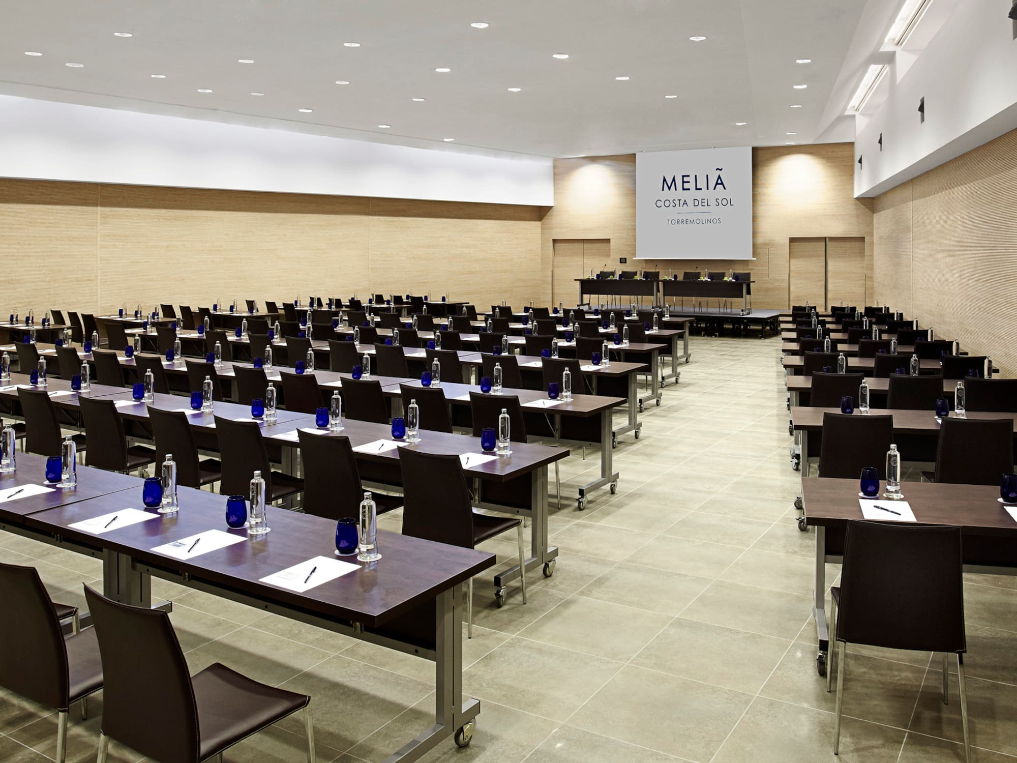 a room with tables and chairs