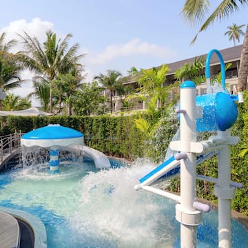 a water slide in a pool