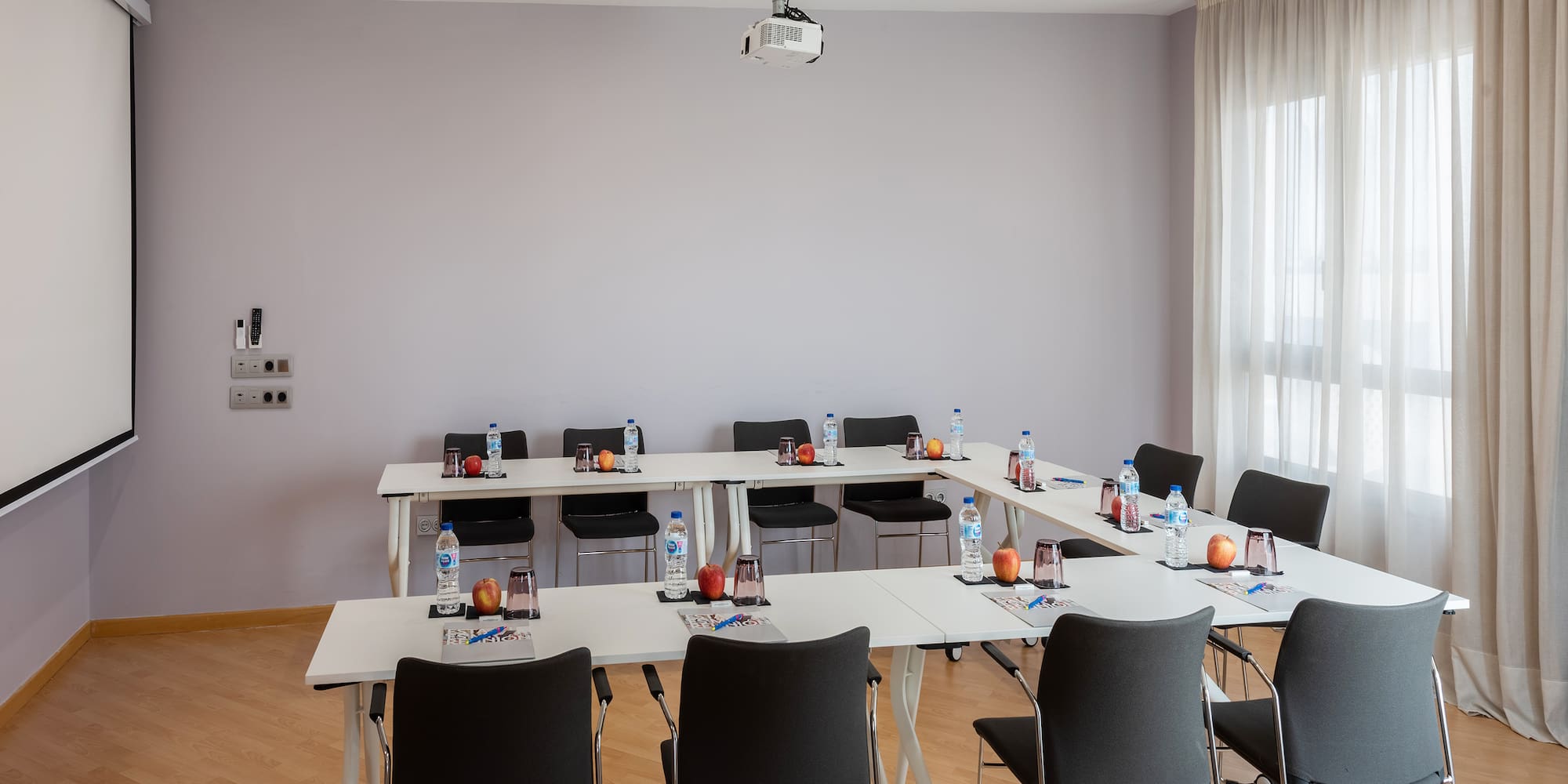 a room with tables and chairs