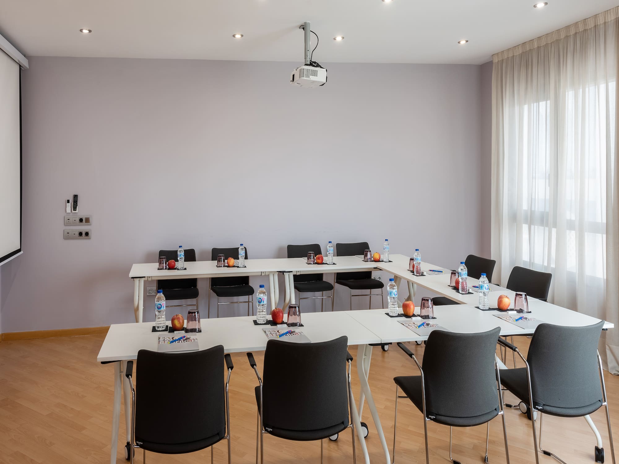 a room with tables and chairs