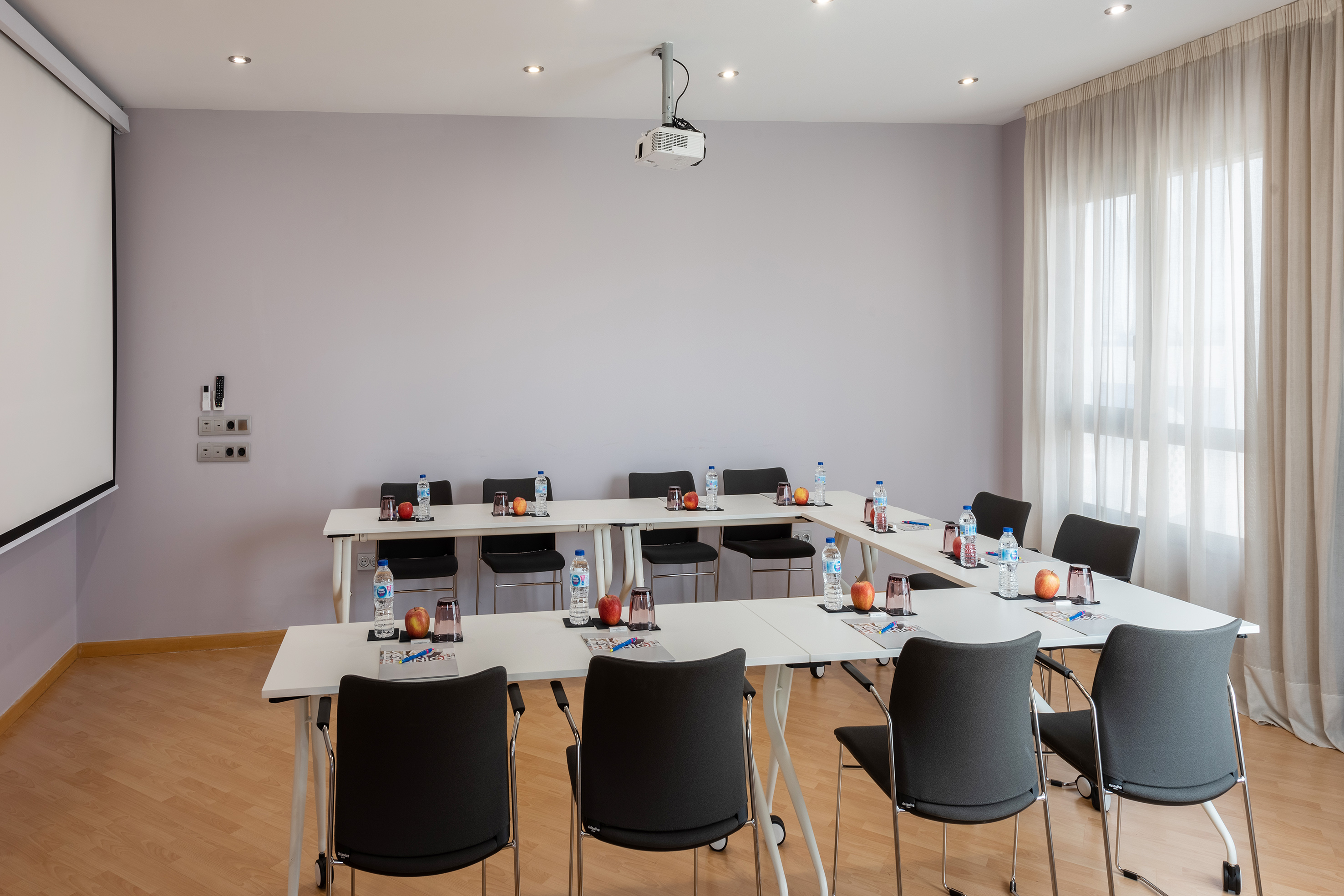 a room with tables and chairs