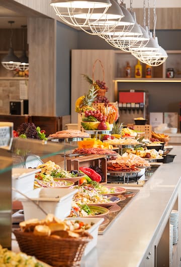 a buffet table with food on it