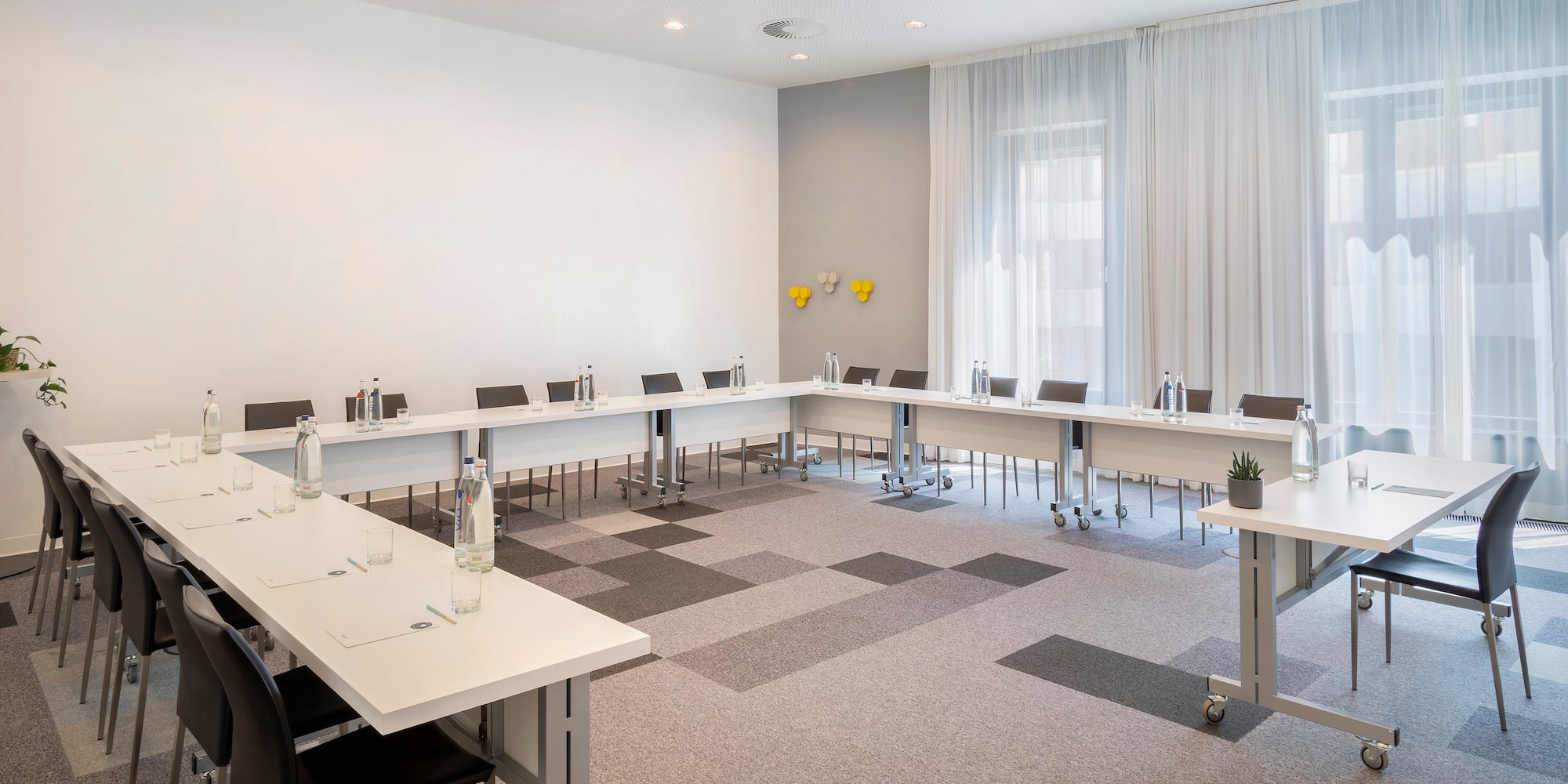 a room with tables and chairs