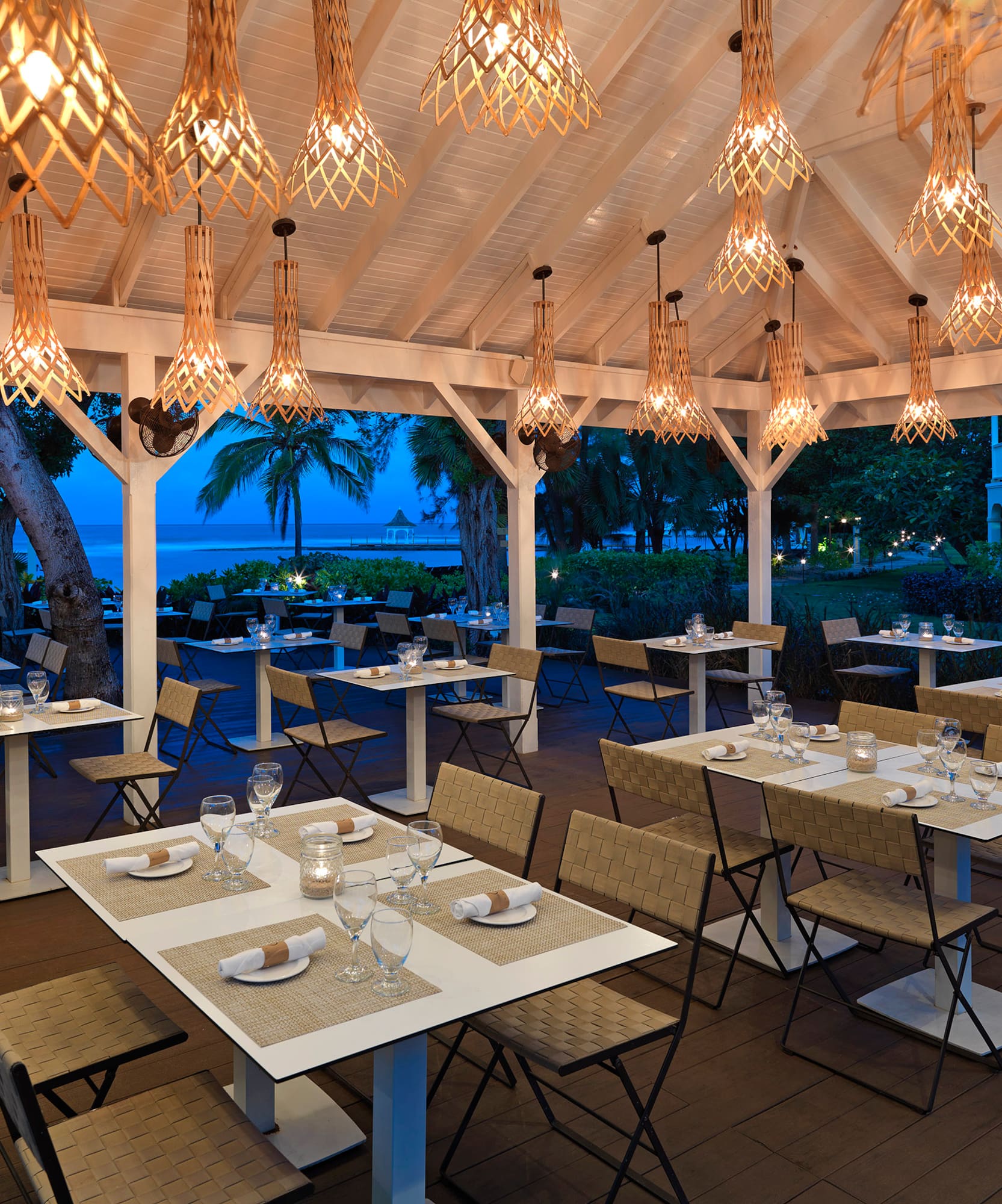 a restaurant with tables and chairs