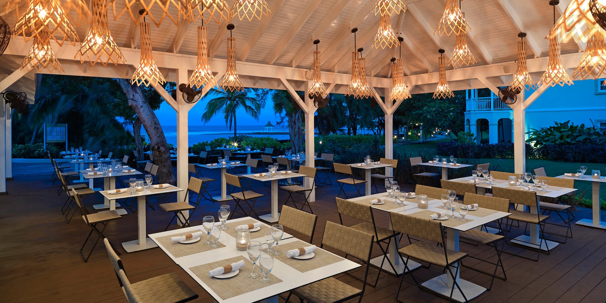 a restaurant with tables and chairs