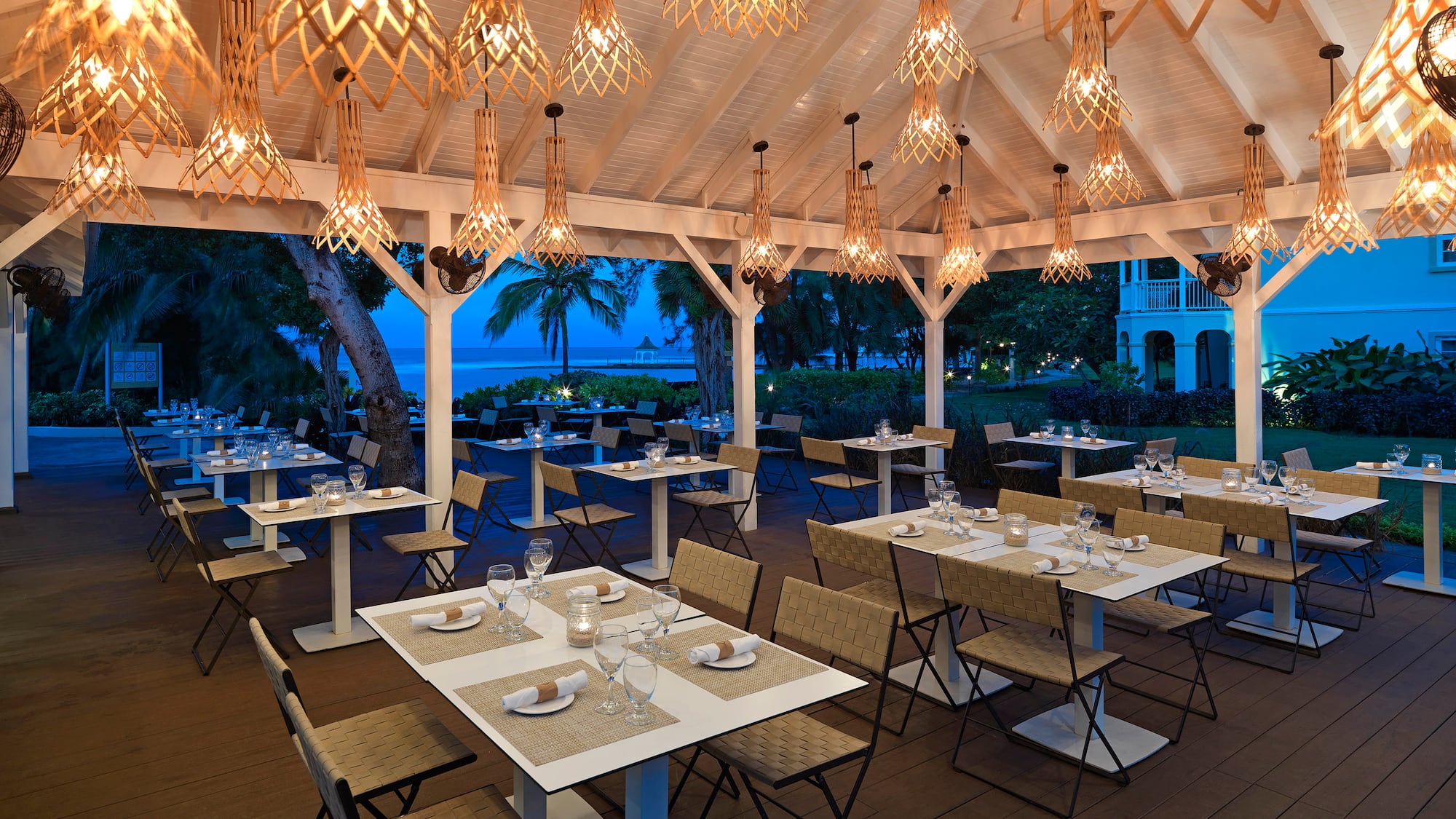a restaurant with tables and chairs