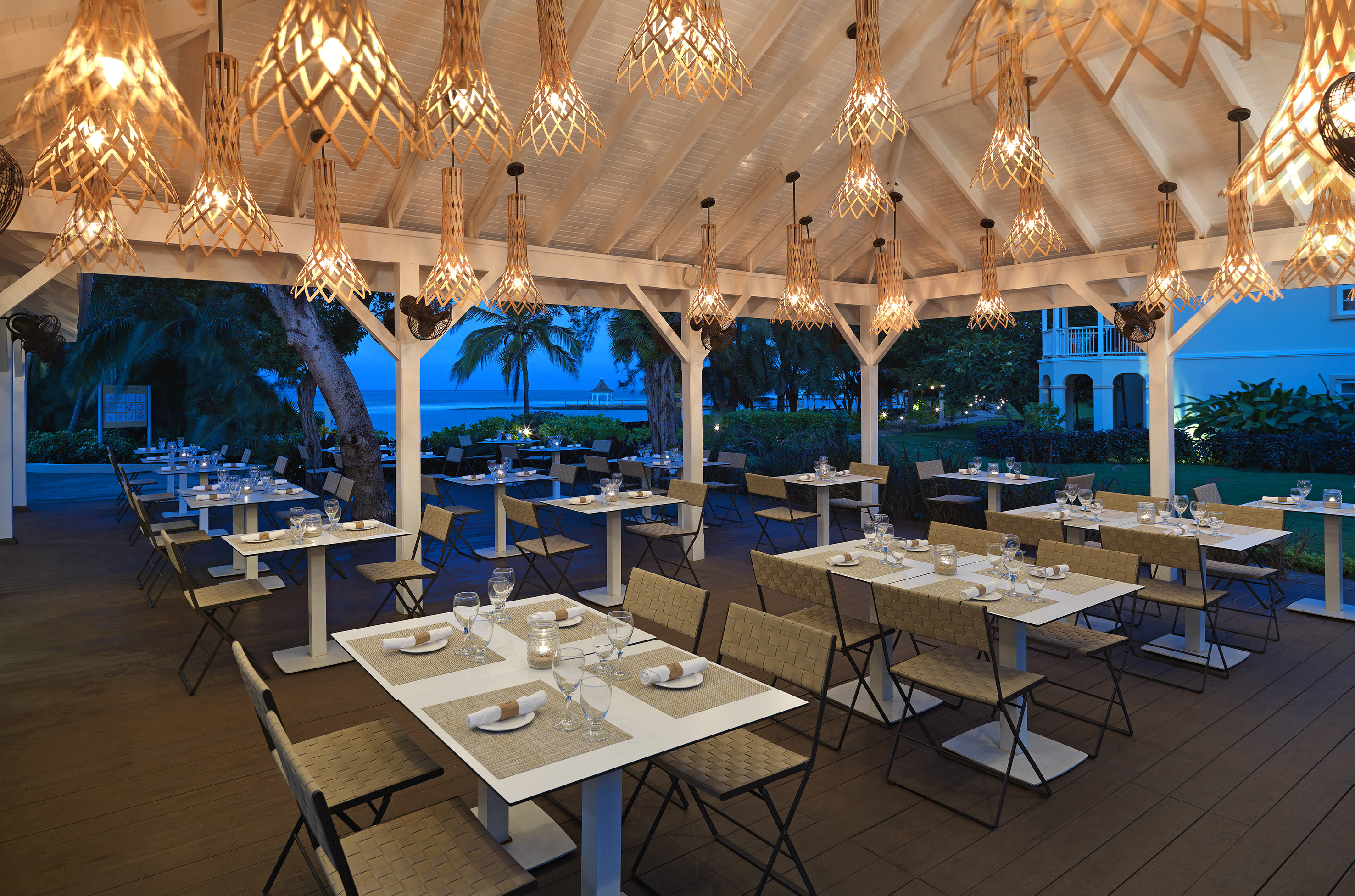 a restaurant with tables and chairs