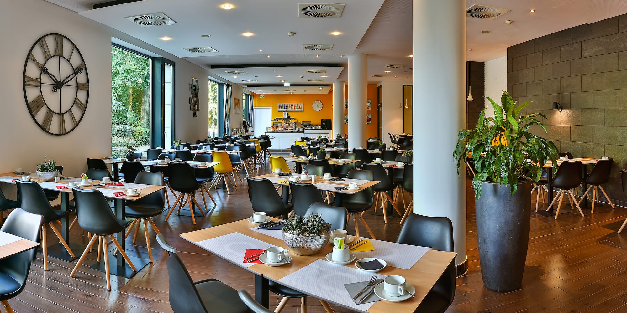 a room with tables and chairs