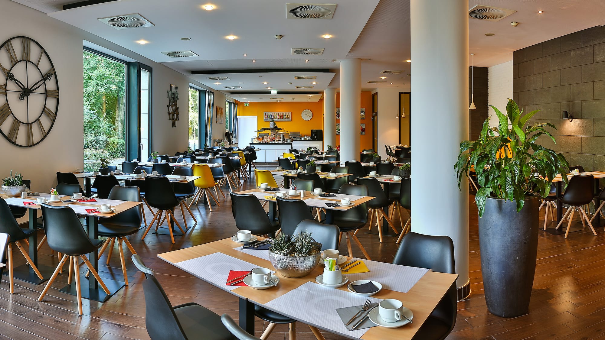 a room with tables and chairs