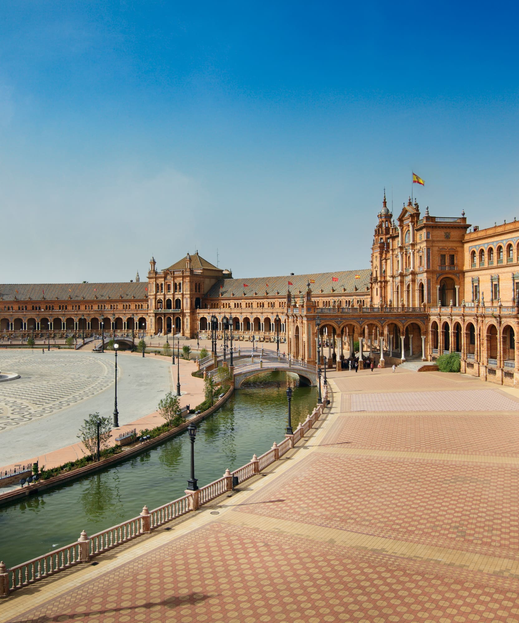 a large building with a pool of water