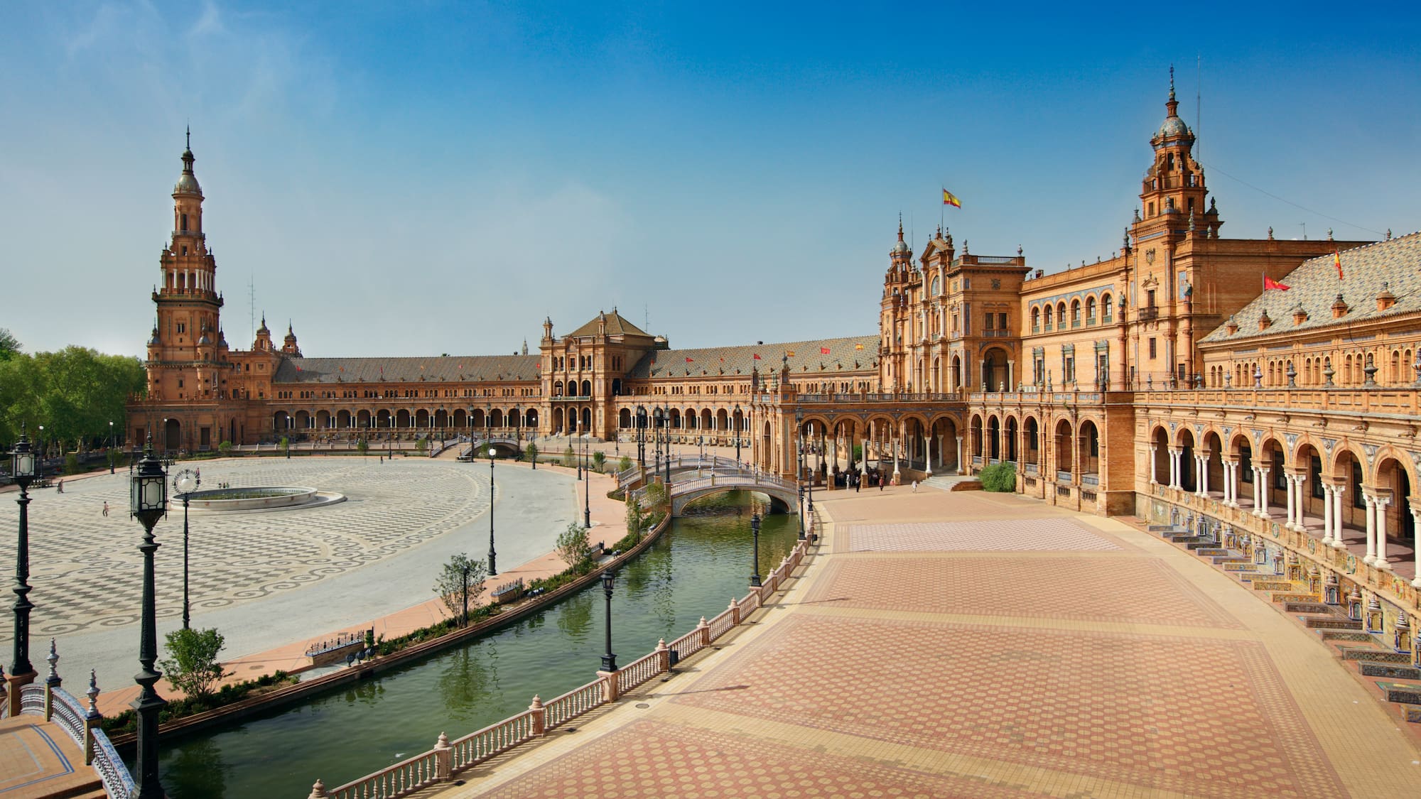 a large building with a pool of water