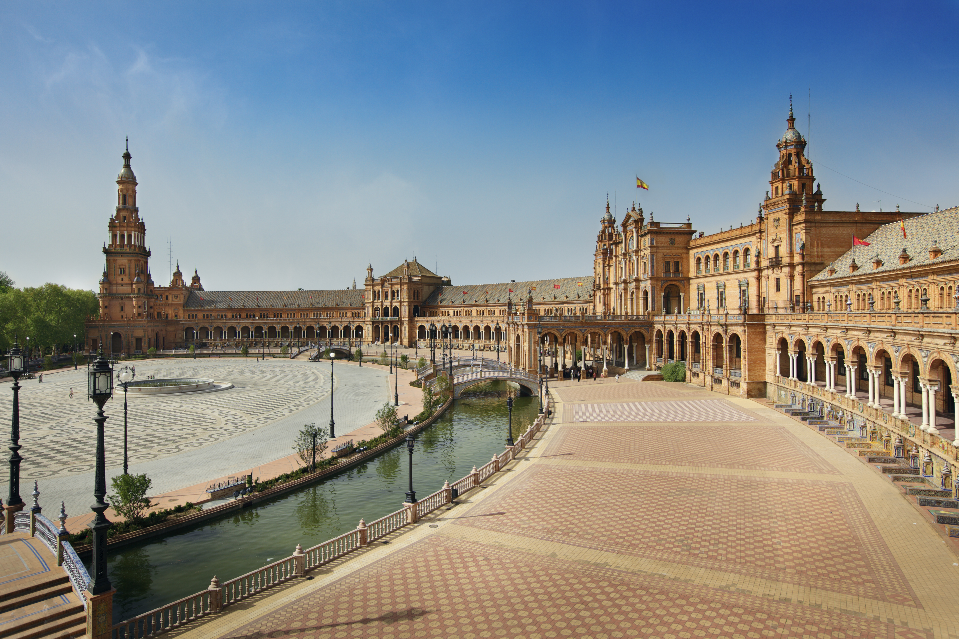 a large building with a pool of water