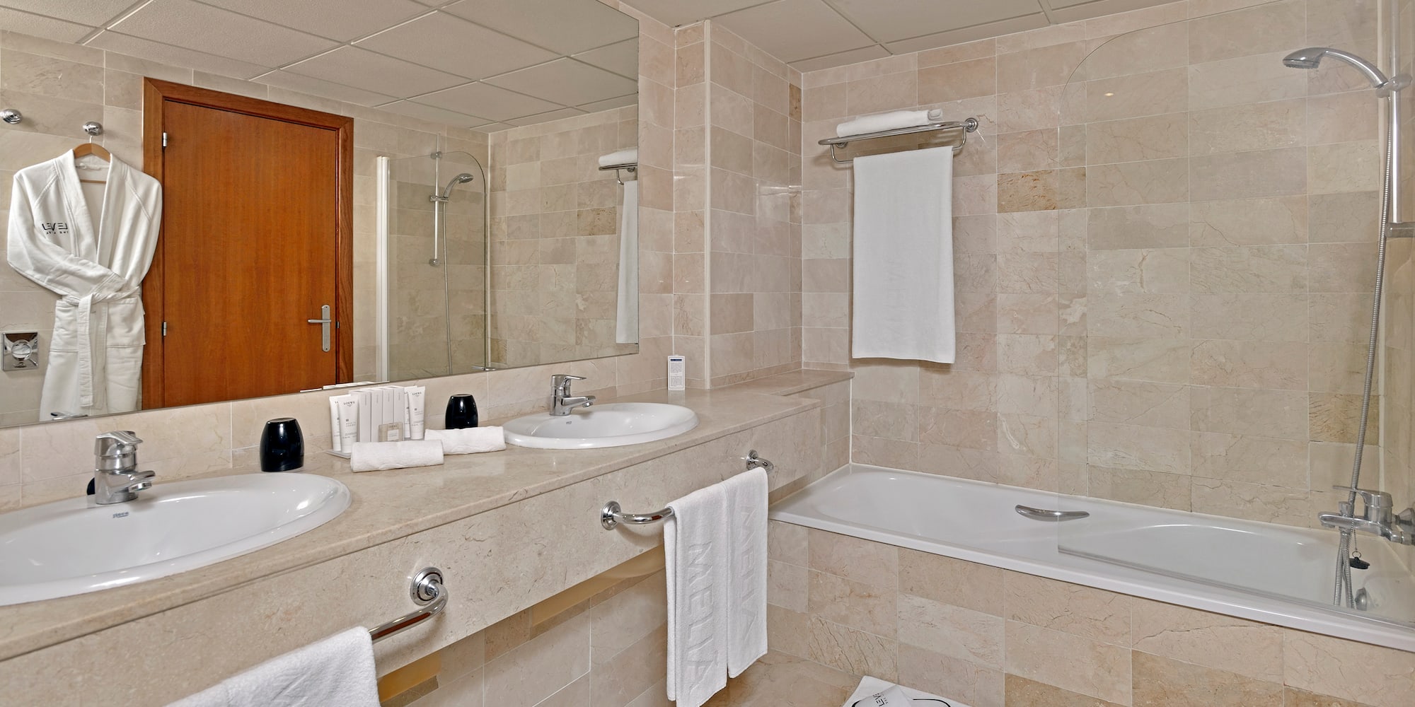 a bathroom with a bathtub and sink