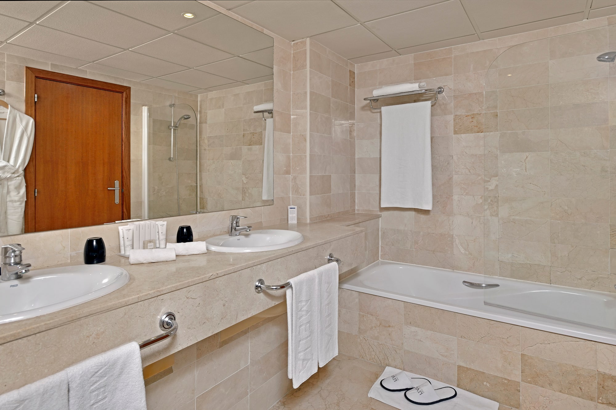 a bathroom with a bathtub and sink