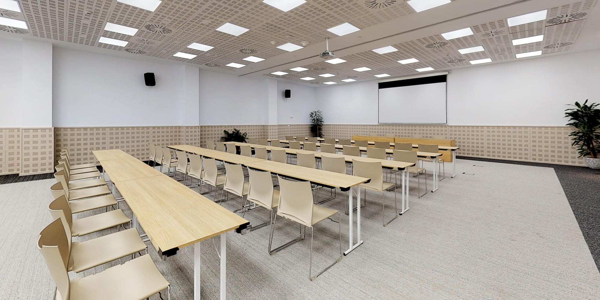 a room with tables and chairs