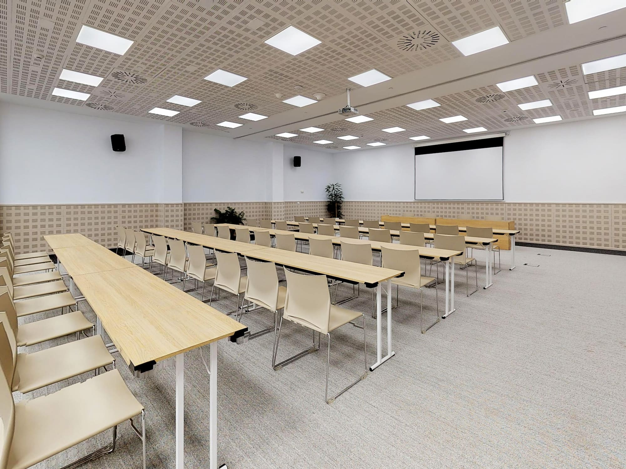 a room with tables and chairs
