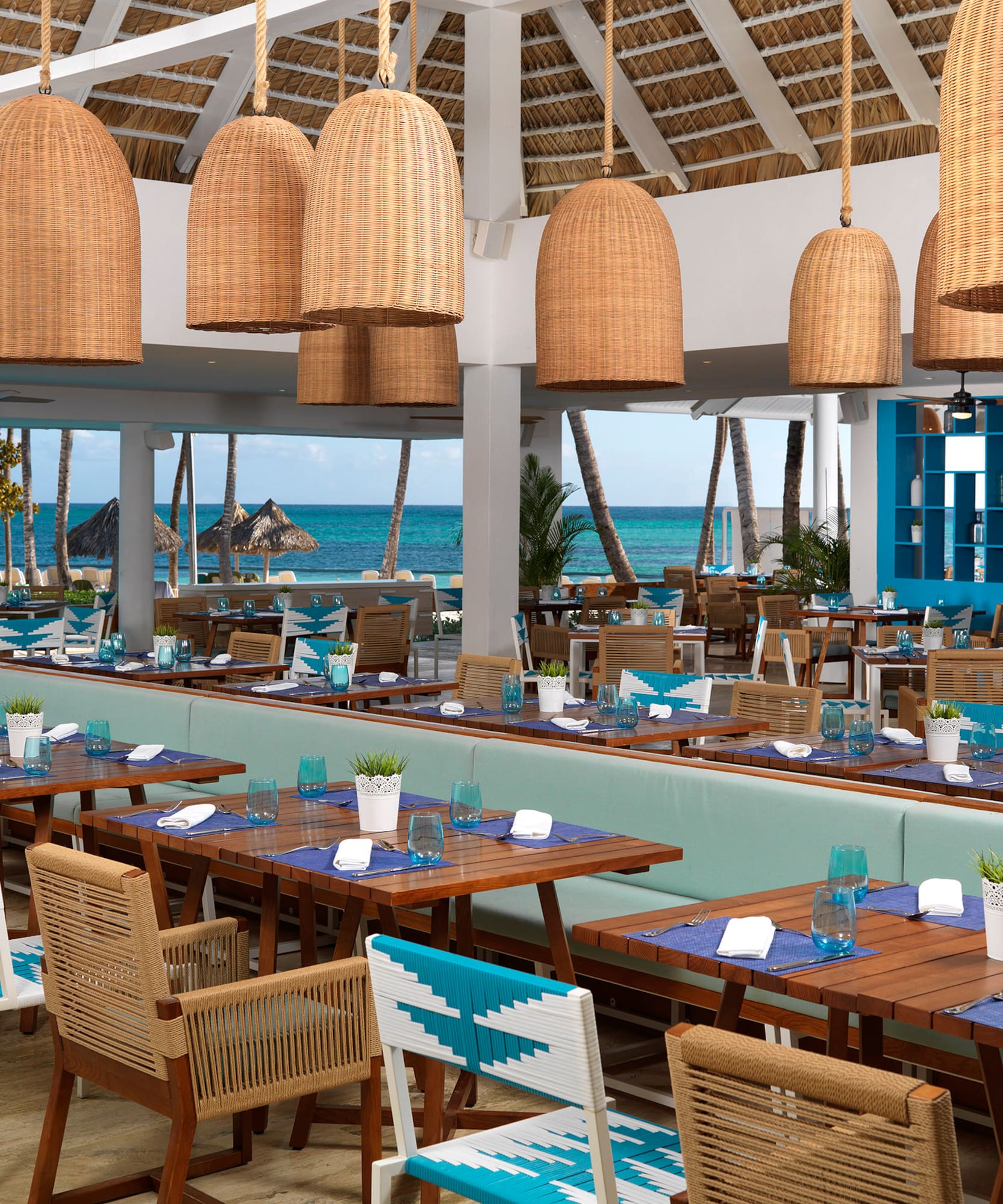 a restaurant with tables and chairs