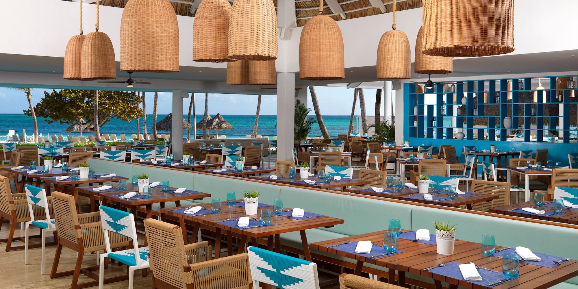 a restaurant with tables and chairs