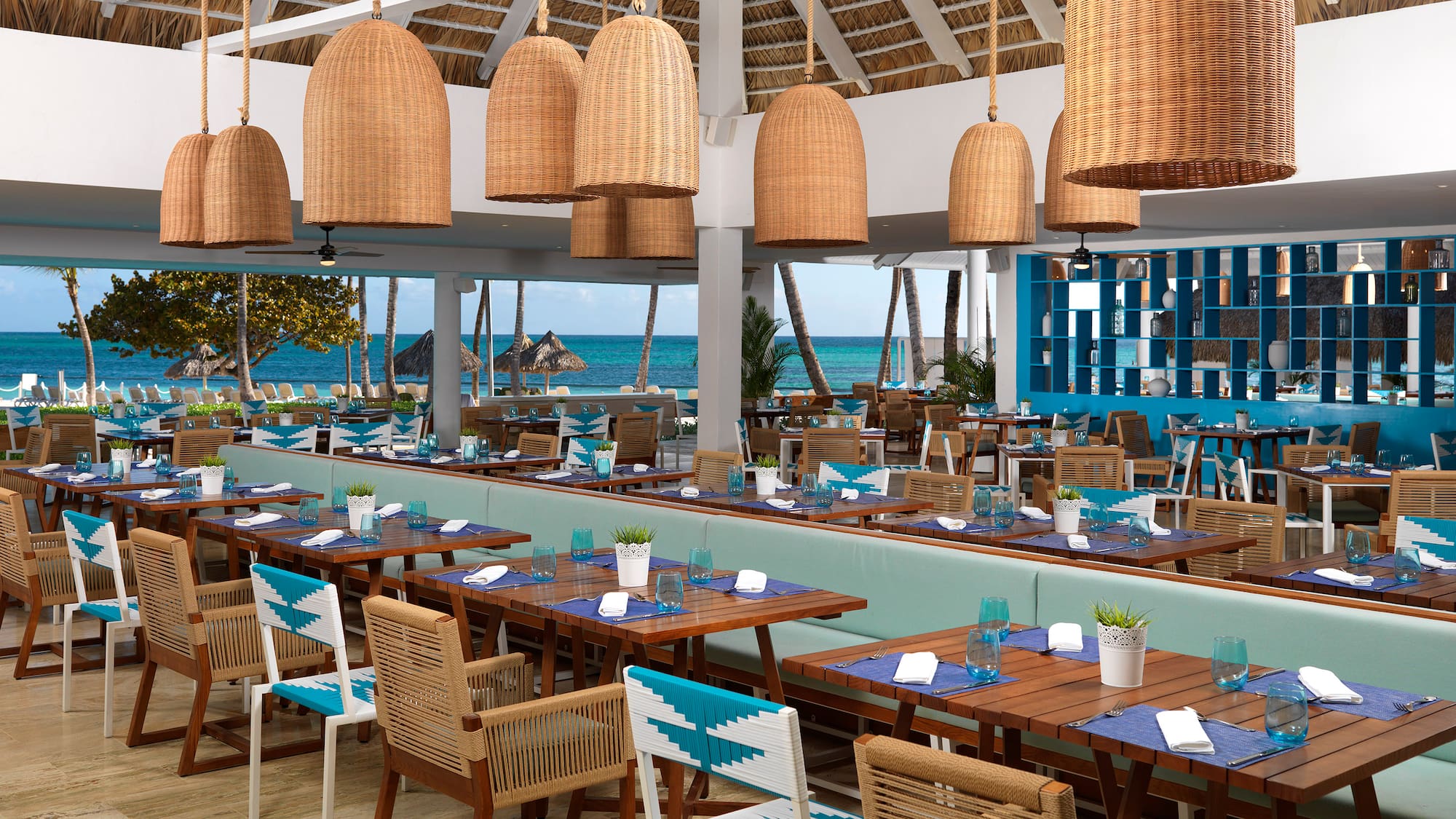 a restaurant with tables and chairs