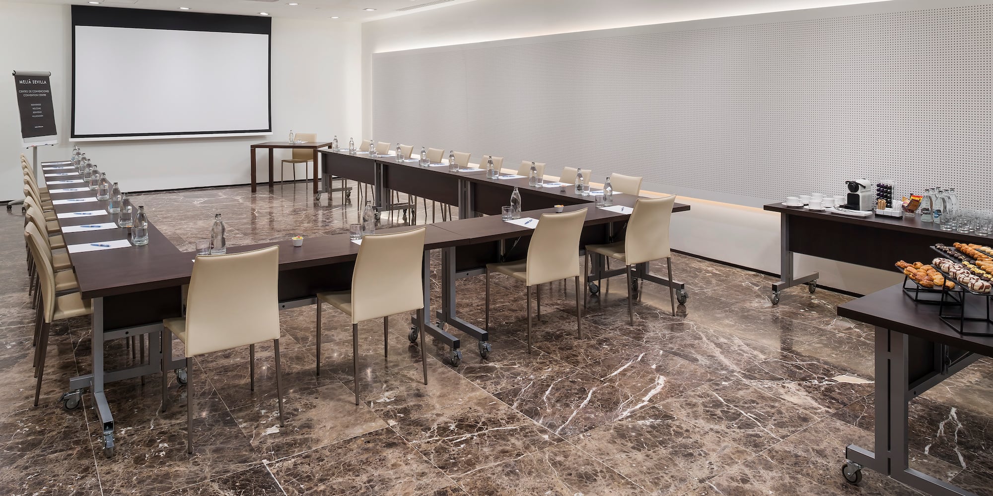 a room with tables and chairs