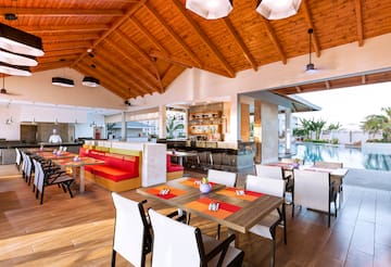 a room with tables and chairs