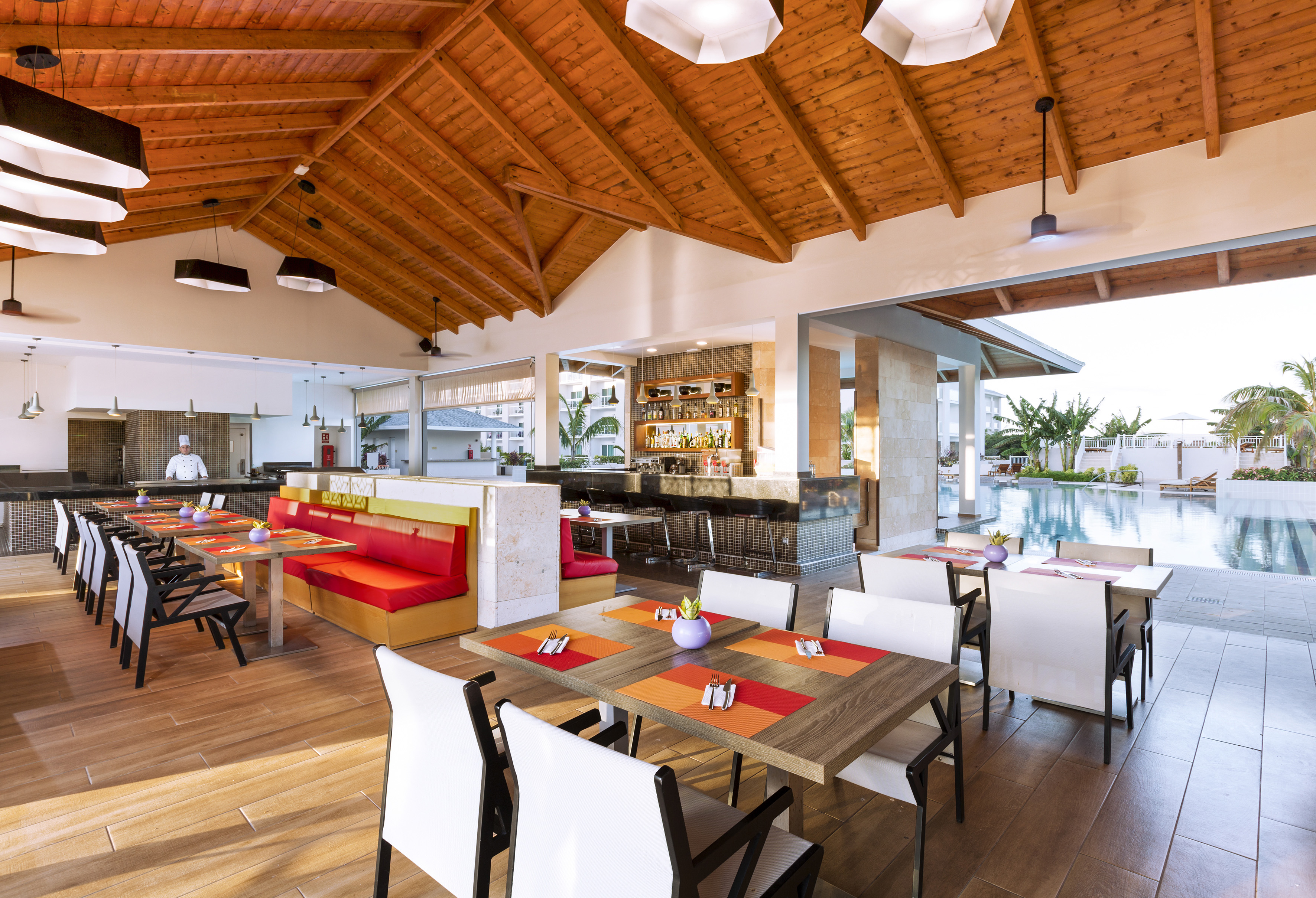 a room with tables and chairs