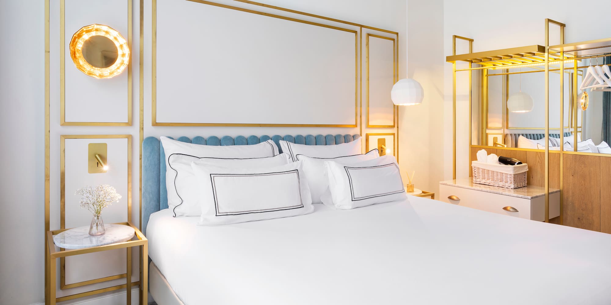 a bedroom with a bed and a mirror