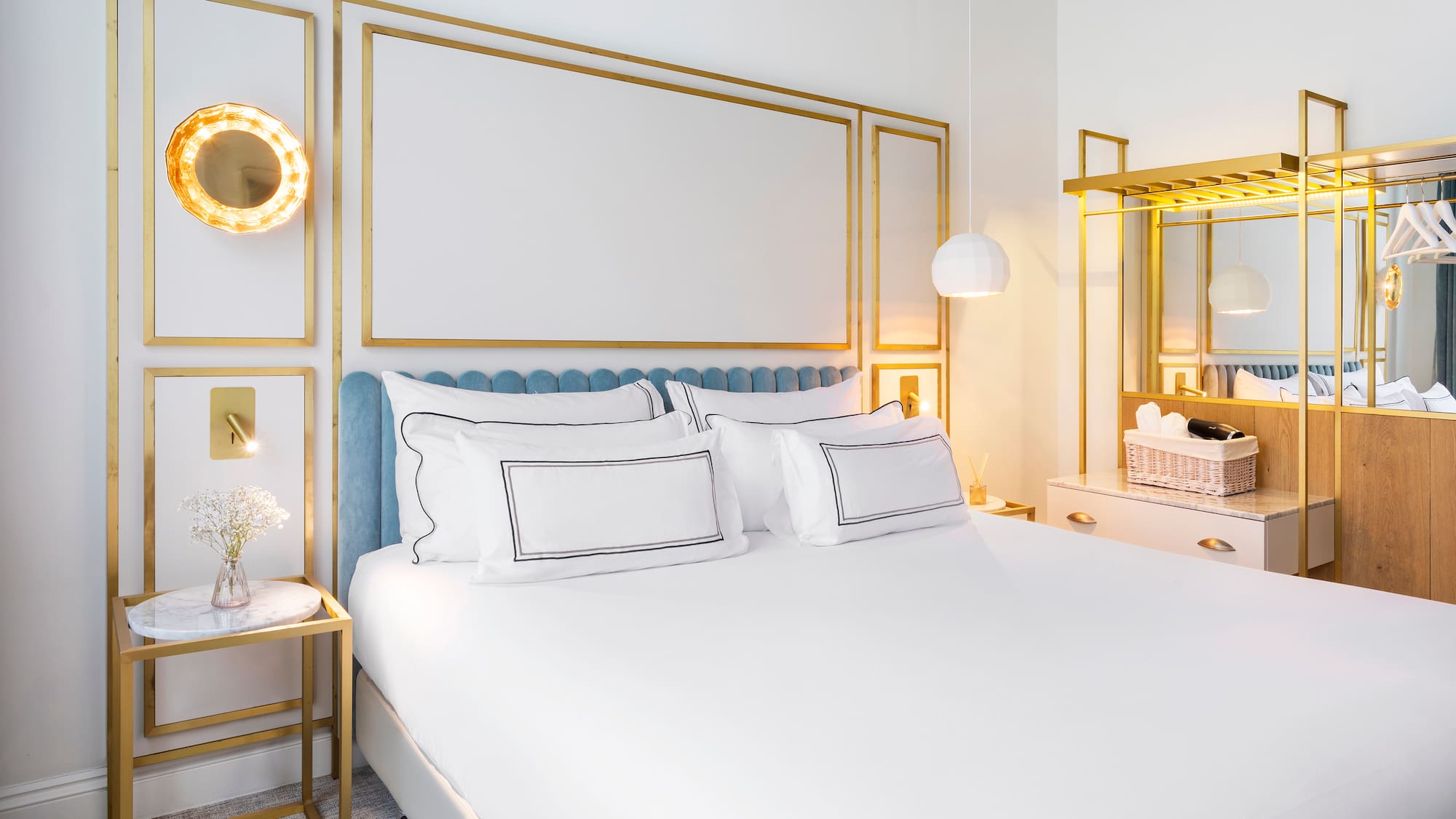 a bedroom with a bed and a mirror