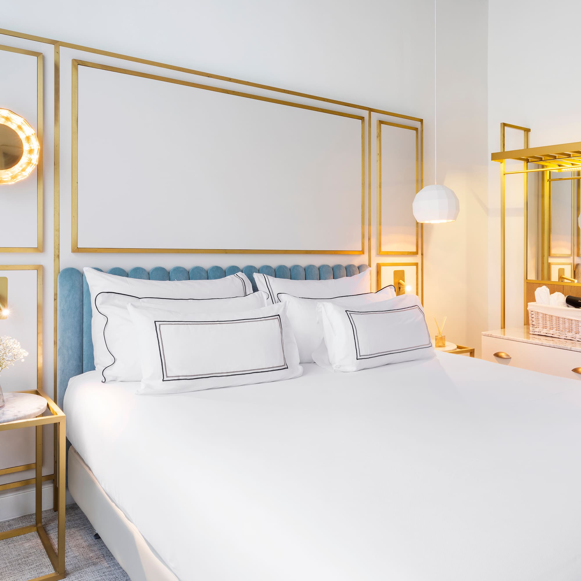 a bedroom with a bed and a mirror