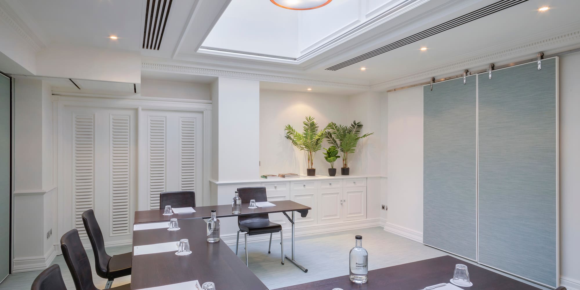 a room with tables and chairs