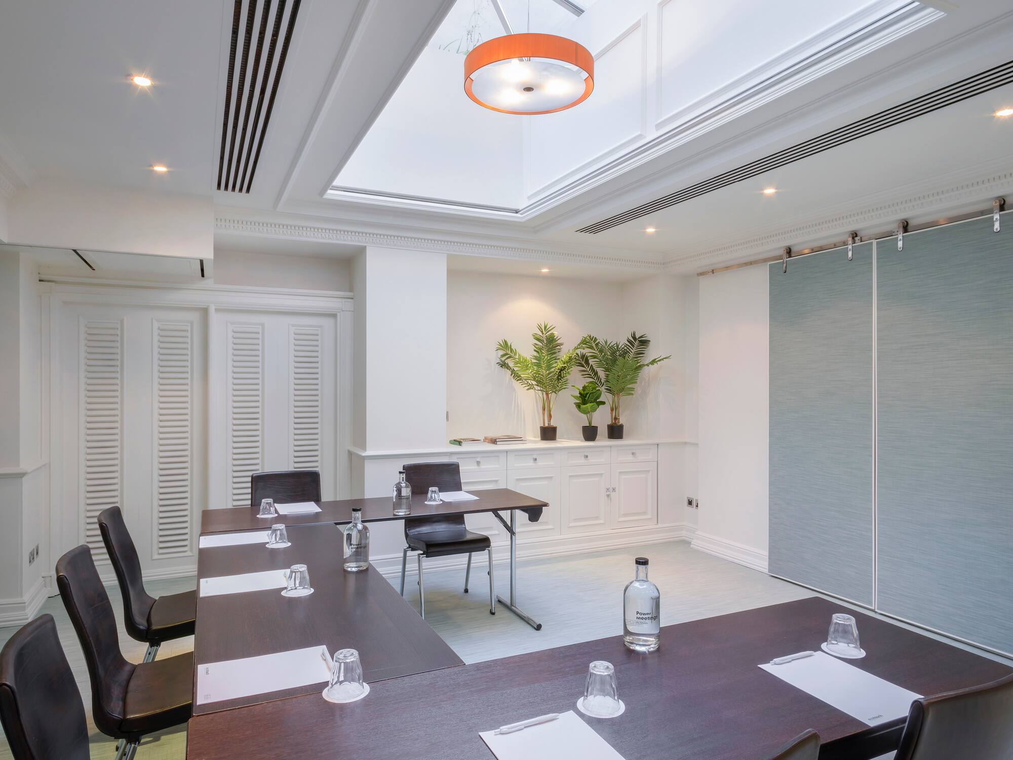 a room with tables and chairs