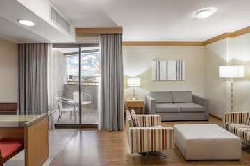 a room with a couch and a glass door
